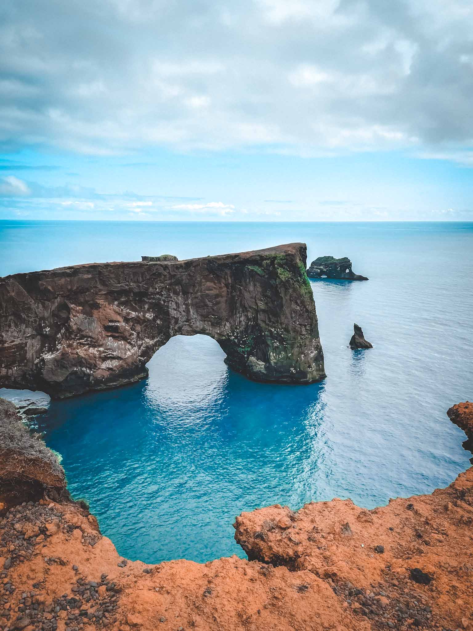 Natural stone arches in Iceland - Dyrhólaey sea arch