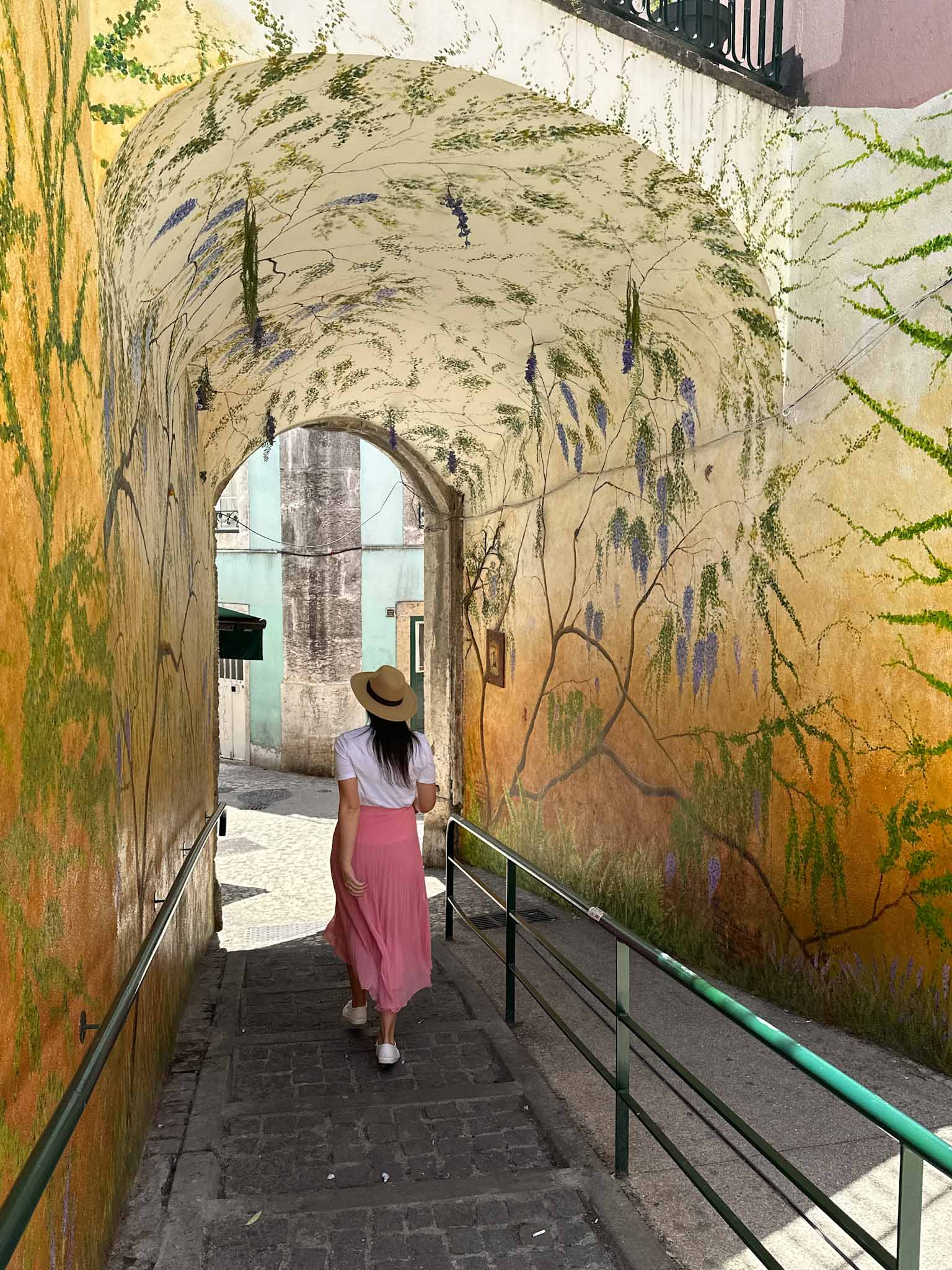 Best Instagram photo spots in Lisbon, Portugal - Street art and flower tunnel in Graça