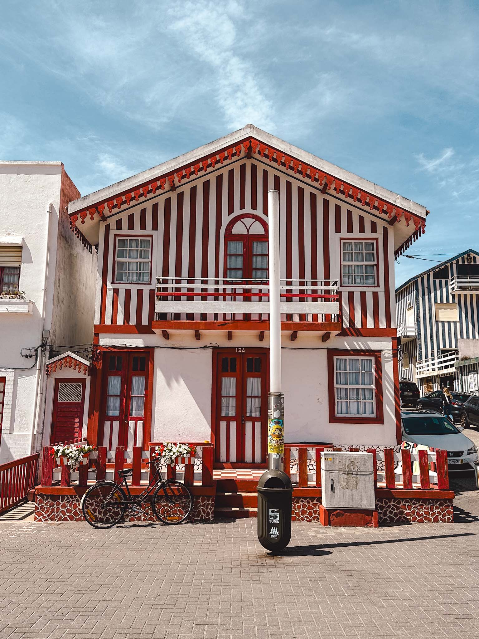 Best things to do in Aveiro, Portugal - candy striped fishermen's houses at Costa Nova