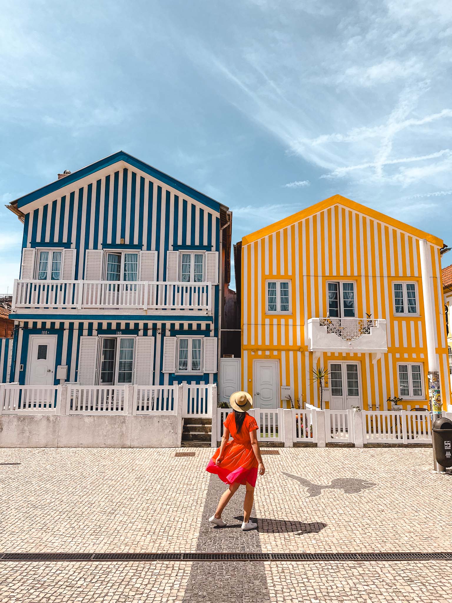 Best Instagram spots in Aveiro, Portugal - candy striped fishermen's houses at Costa Nova