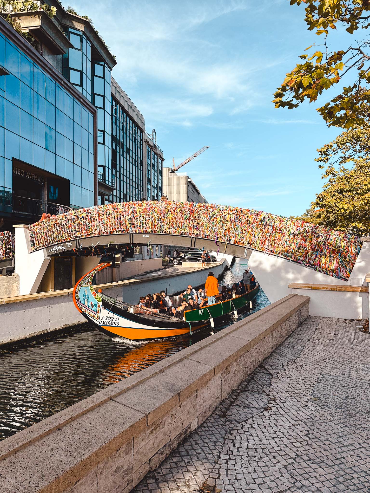 Best things to do in Aveiro, Portugal - friendship bridge with colorful ribbons
