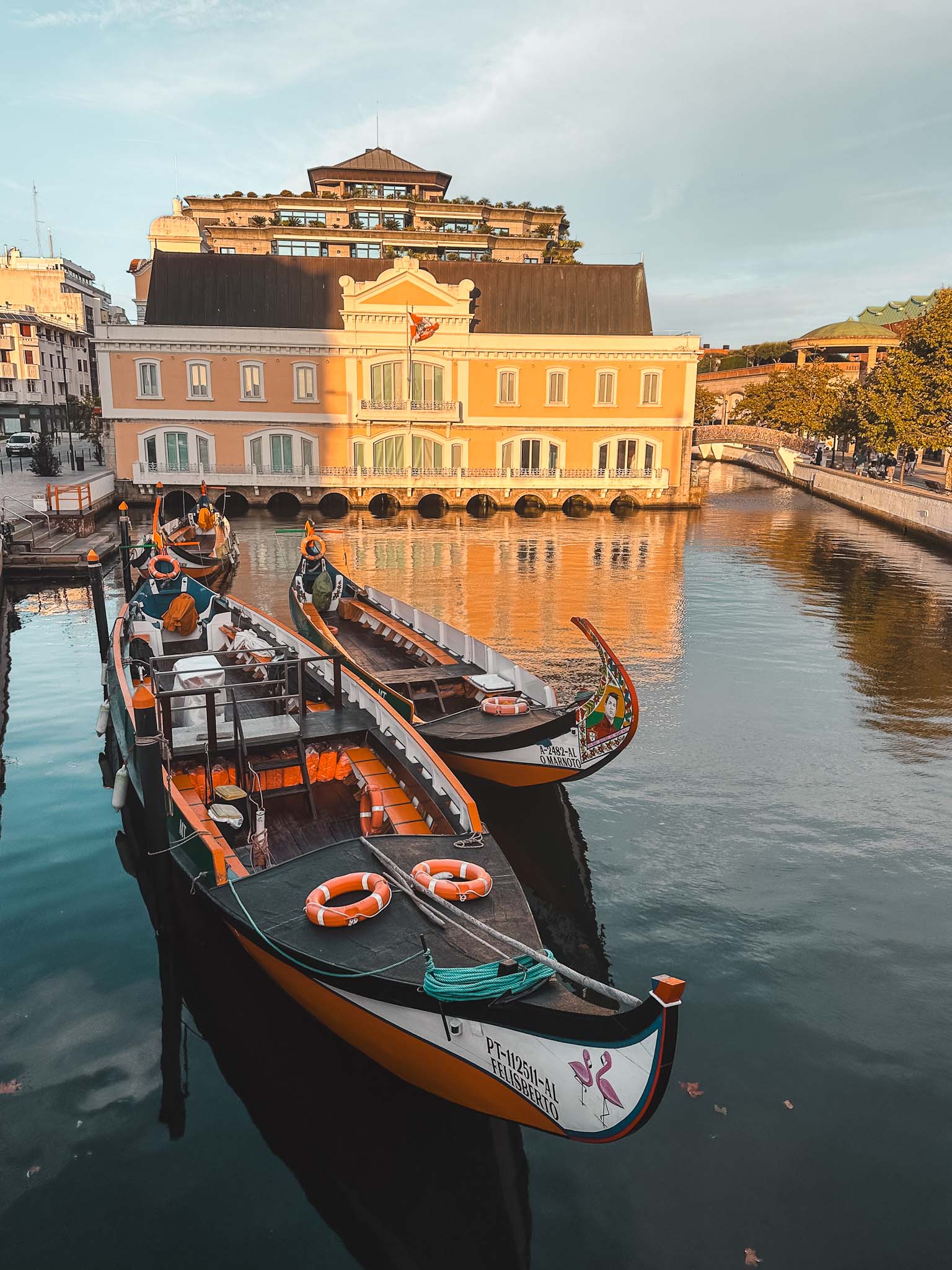 Best things to do in Aveiro, Portugal - ride through the city canals in Barcos Moliceiros gondola boats