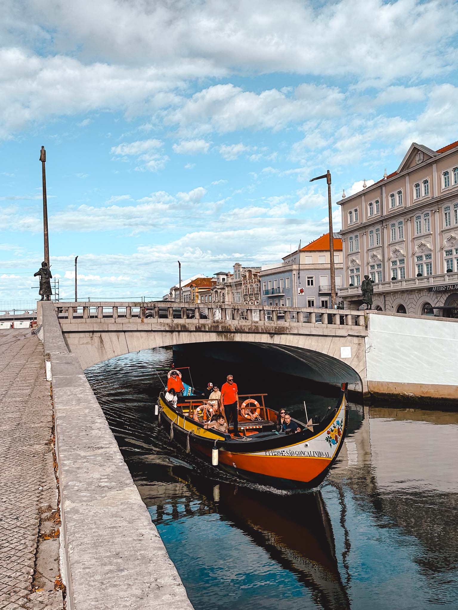 Best things to do in Aveiro, Portugal - ride through the city canals in Barcos Moliceiros gondola boats
