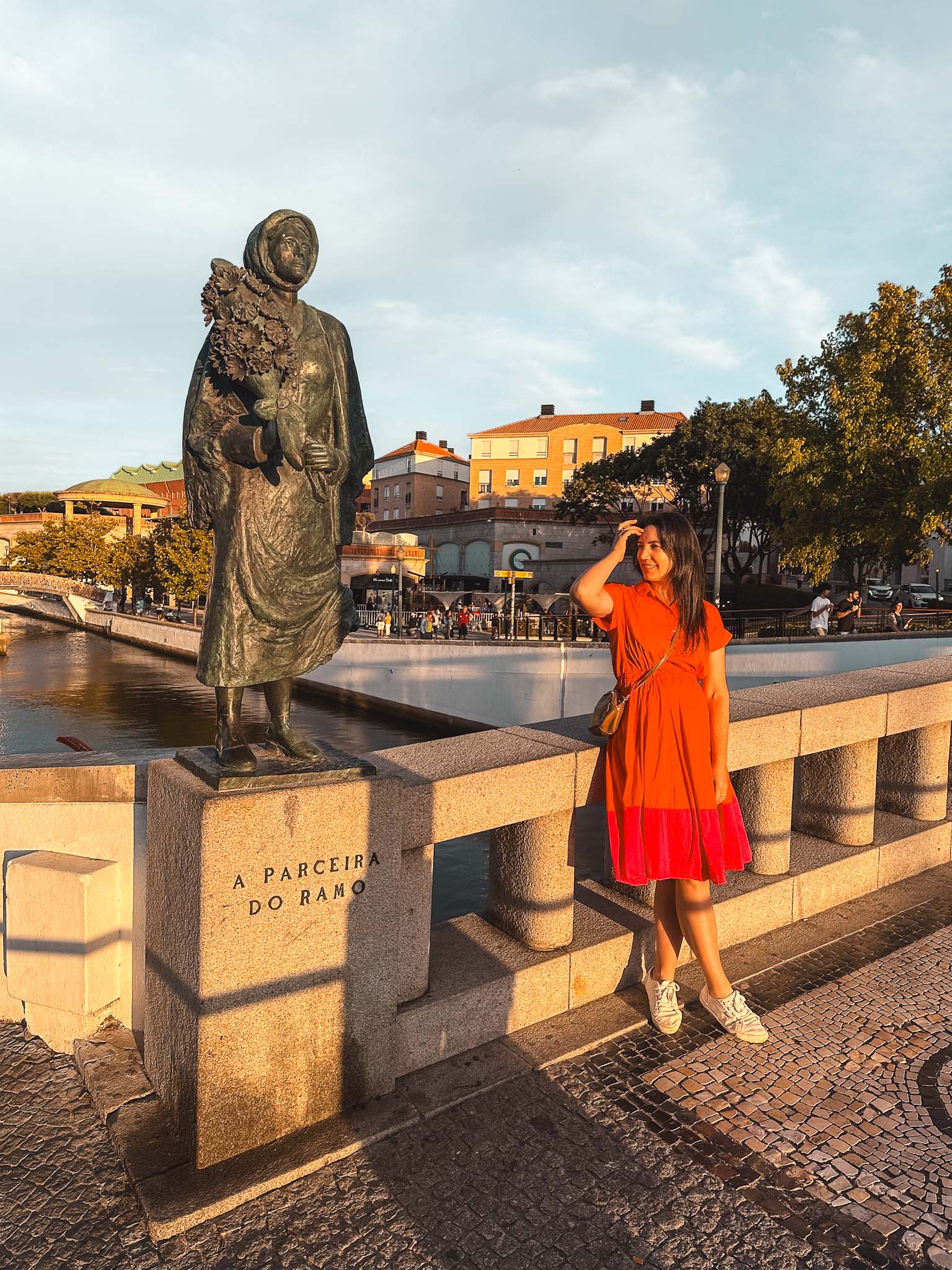 Best things to do in Aveiro - visit the four traditional statues on the bridge
