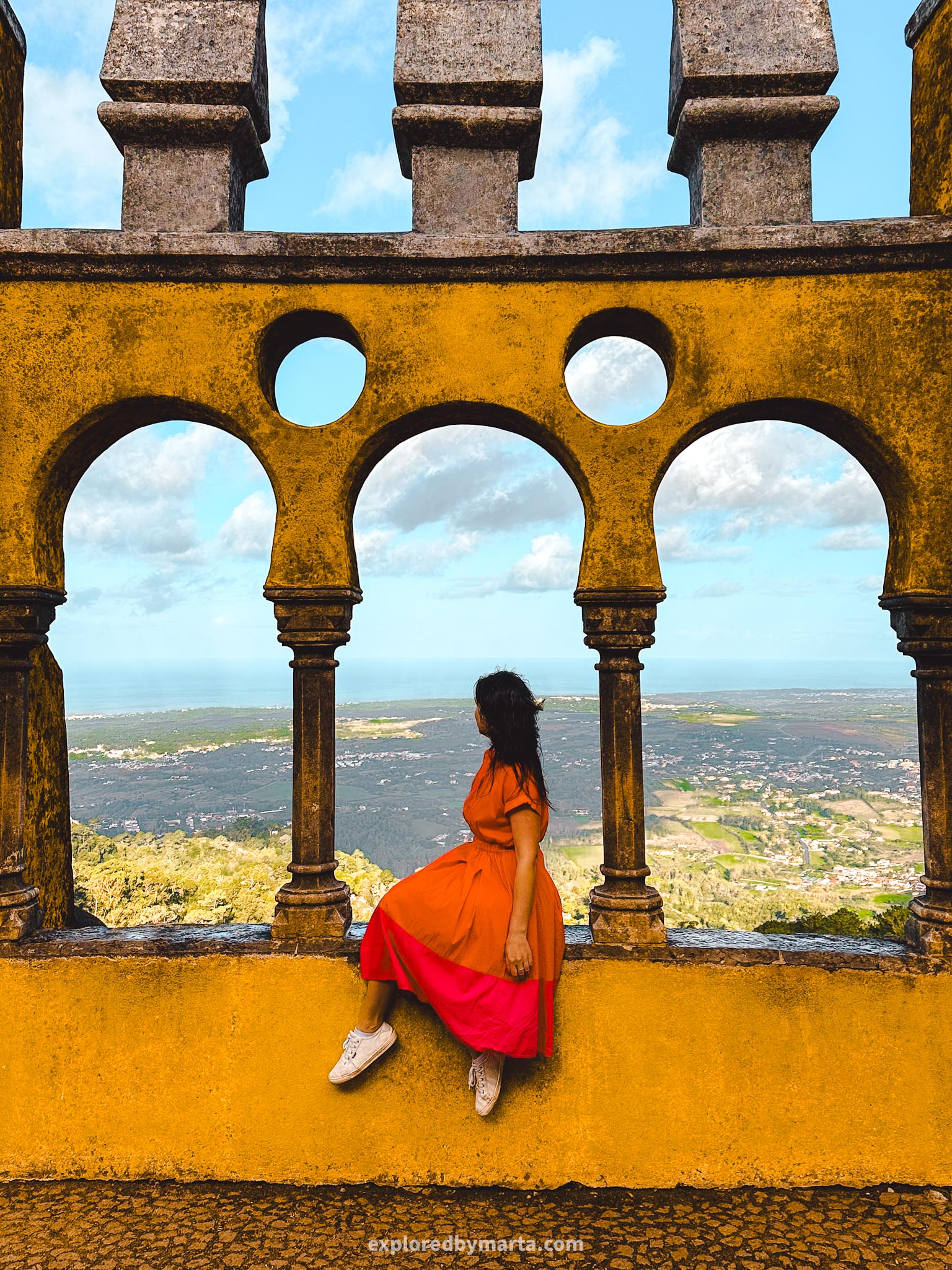 Instagram spots in Sintra, Portugal - yellow archways at the Palace of Pena