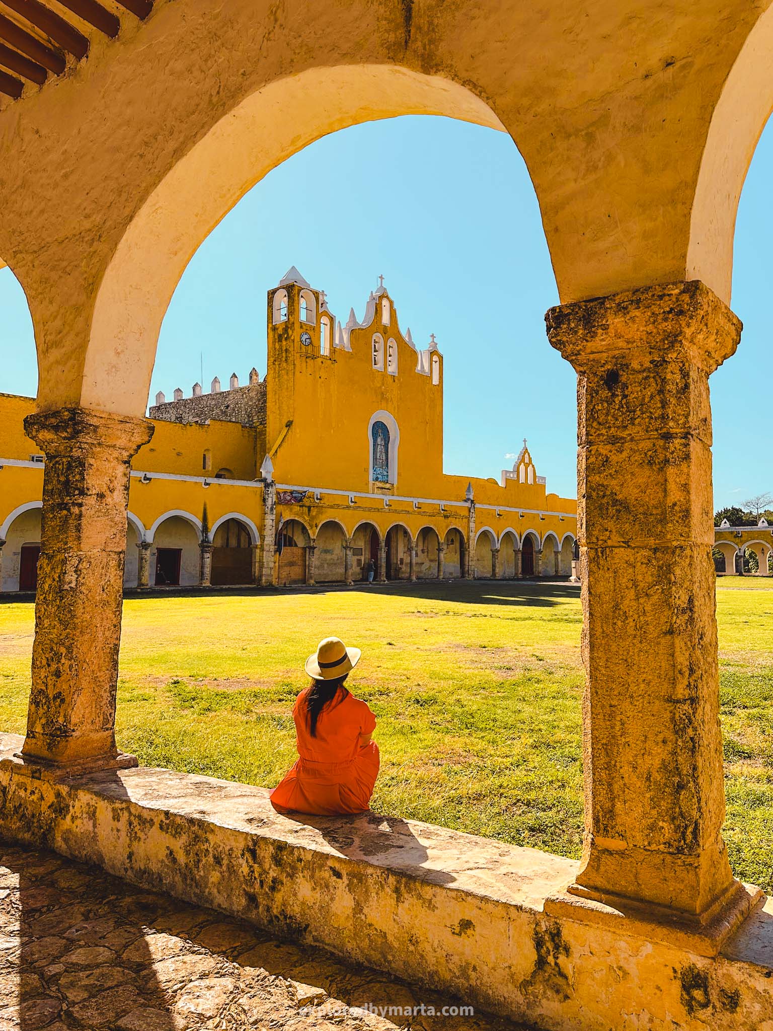 Izamal, Mexico-the yellow Convento de San Antonio convent hosts the second largest atrium in the world - a grass-covered square surrounded by a beautiful arcade