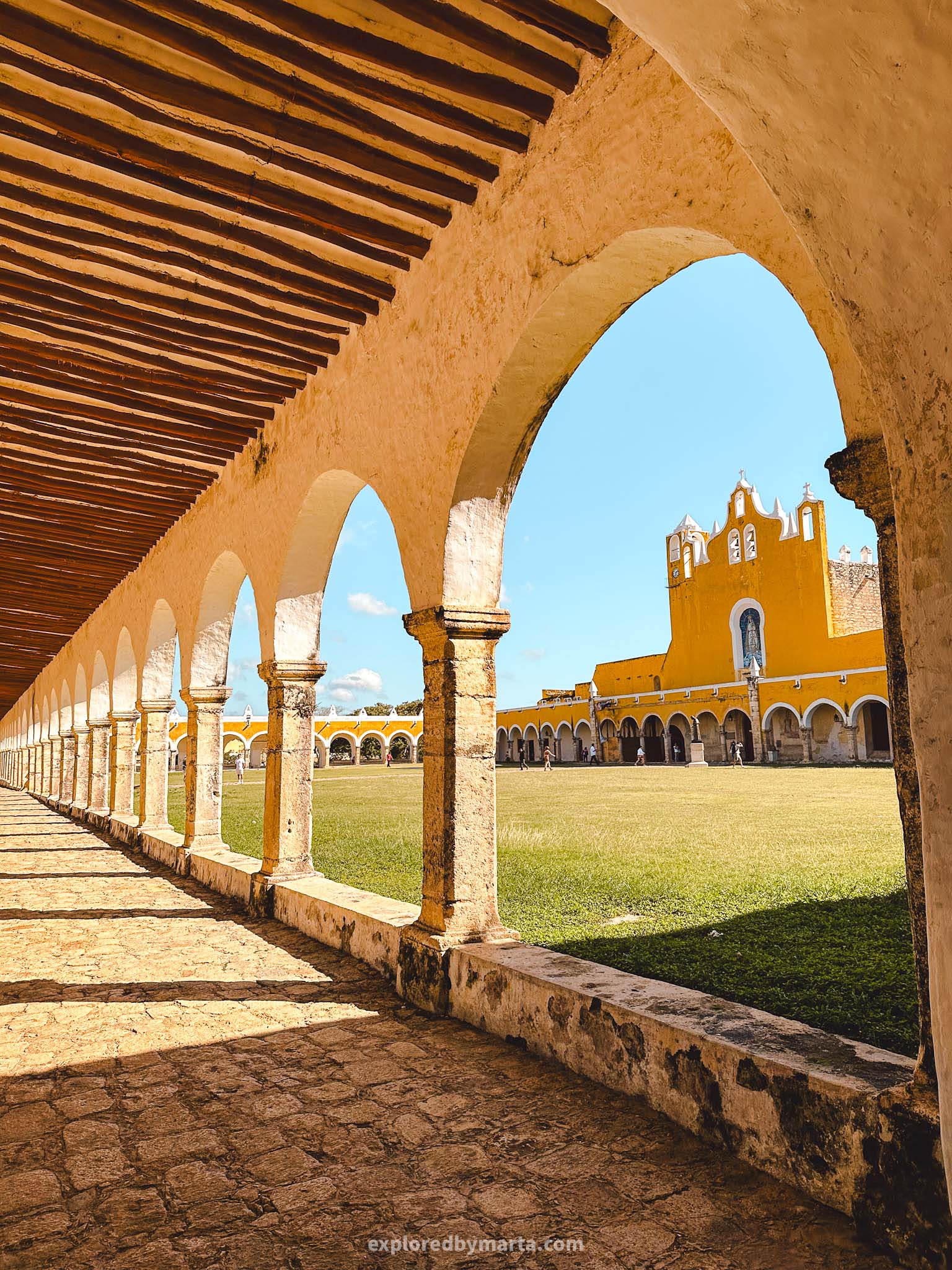 Izamal, Mexico-the yellow Convento de San Antonio convent hosts the second largest atrium in the world - a grass-covered square surrounded by a beautiful arcade