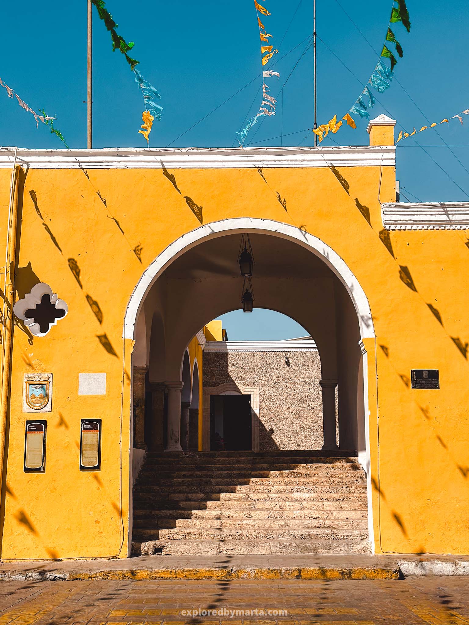 Izamal, Mexico-the yellow Palacio Municipal Izamal or the Town Hall of Izamal is an impressive yellow building situated at 5 de Mayo Park and features a beautiful arcade
