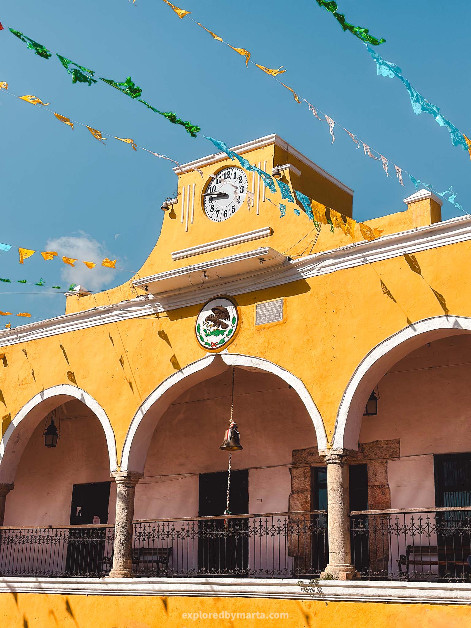 Izamal, Mexico-the yellow Palacio Municipal Izamal or the Town Hall of Izamal is an impressive yellow building situated at 5 de Mayo Park and features a beautiful arcade