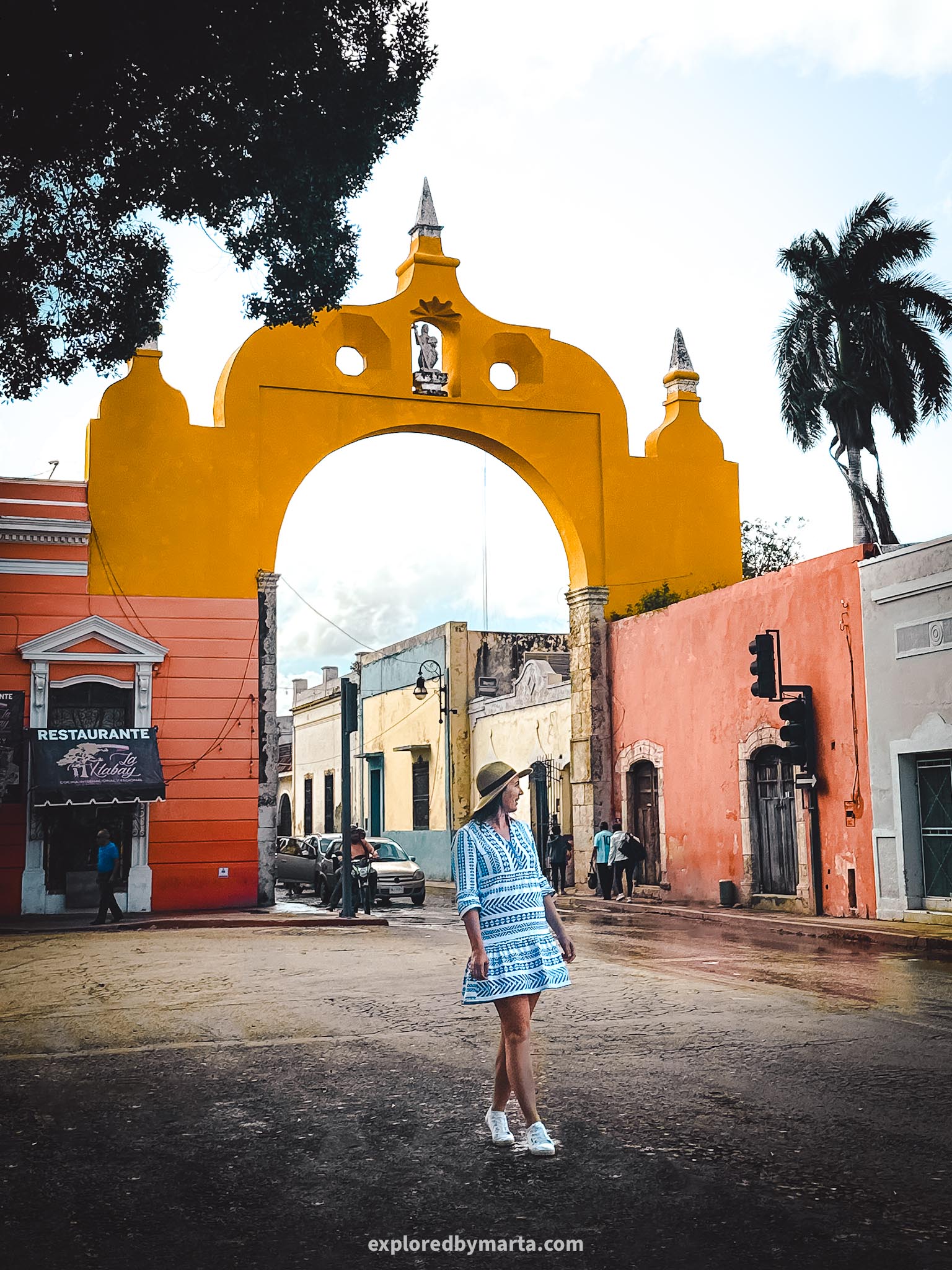 Merida, Mexico-yellow colonial arch at Parque de San Juan in Merida, Mexico