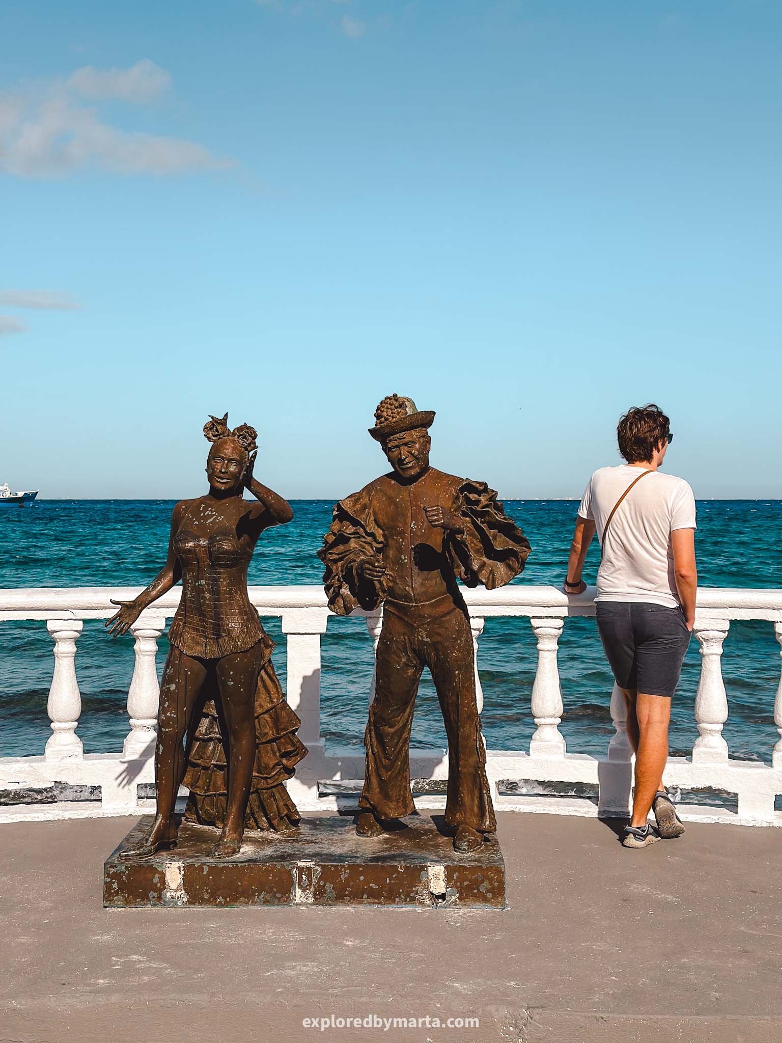 Bronze statues at the seaside promenade in Cozumel, Mexico