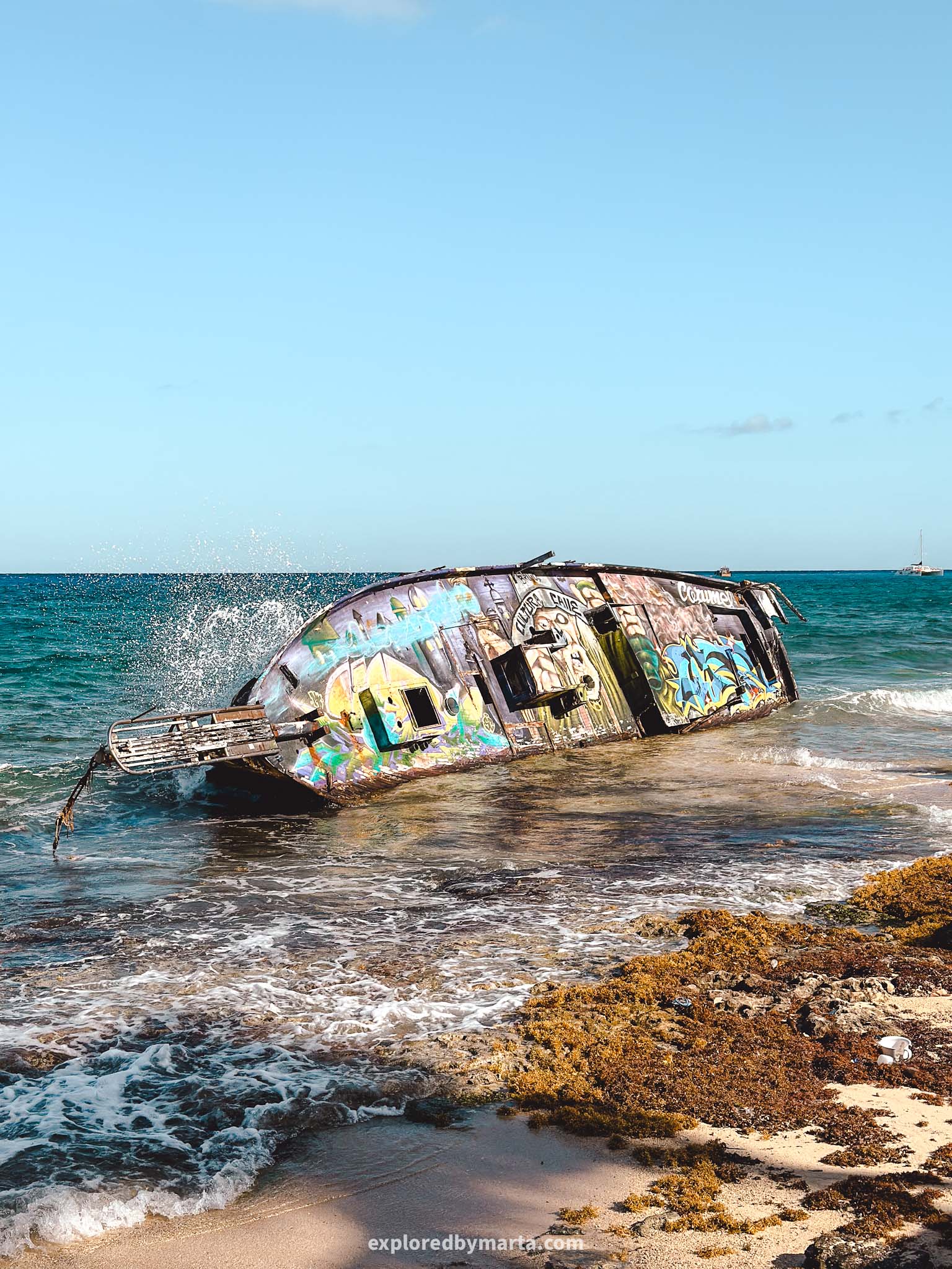 Sunken ship next to the seaside promenade in Cozumel, Mexico