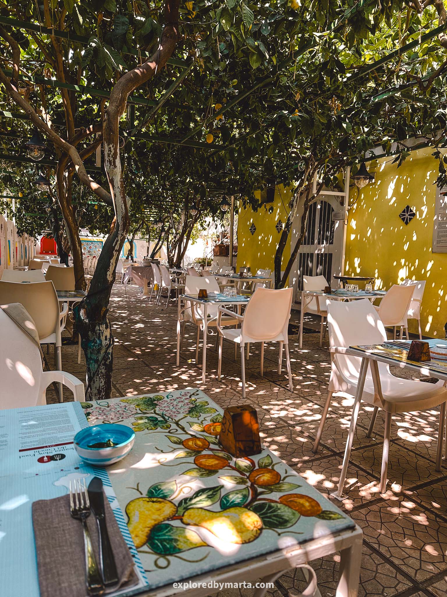 Maiori, Italy-Ristorante Pineta in Maiori with a courtyard covered by lemon trees