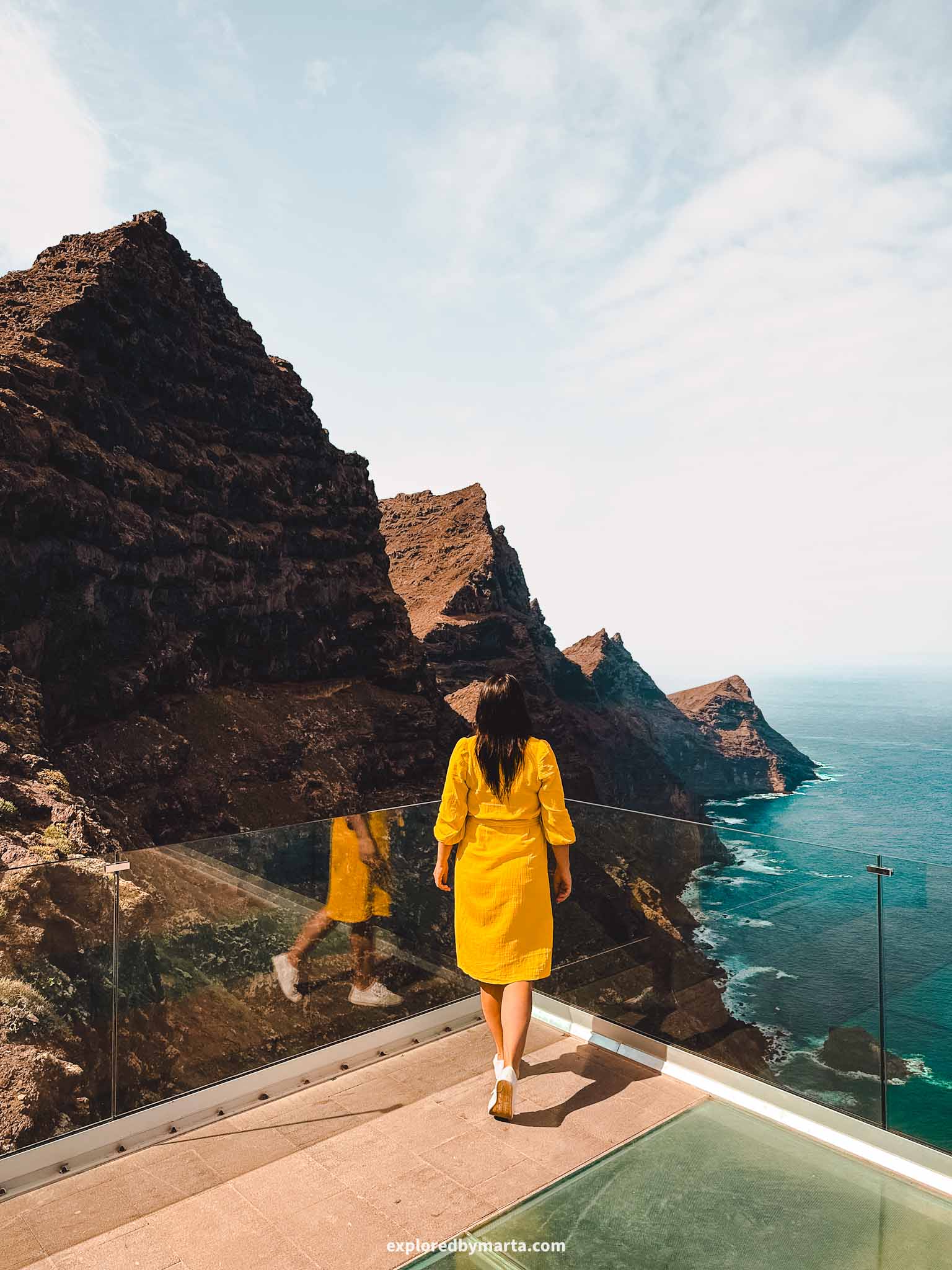 Gran Canaria, Spain-Mirador del Balcón glass viepoint overlooking the coastline of Gran Canaria and its iconic Dragons Tail