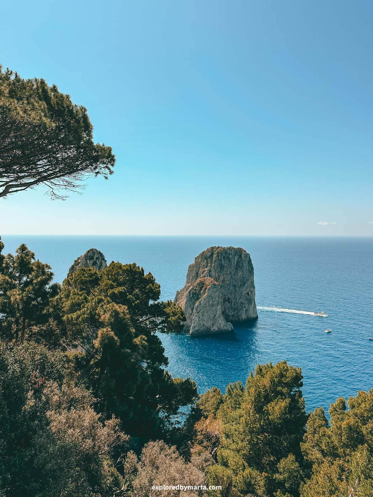 Faraglioni di Capri rocks from Pizzolungo trail in Capri Island, Italy