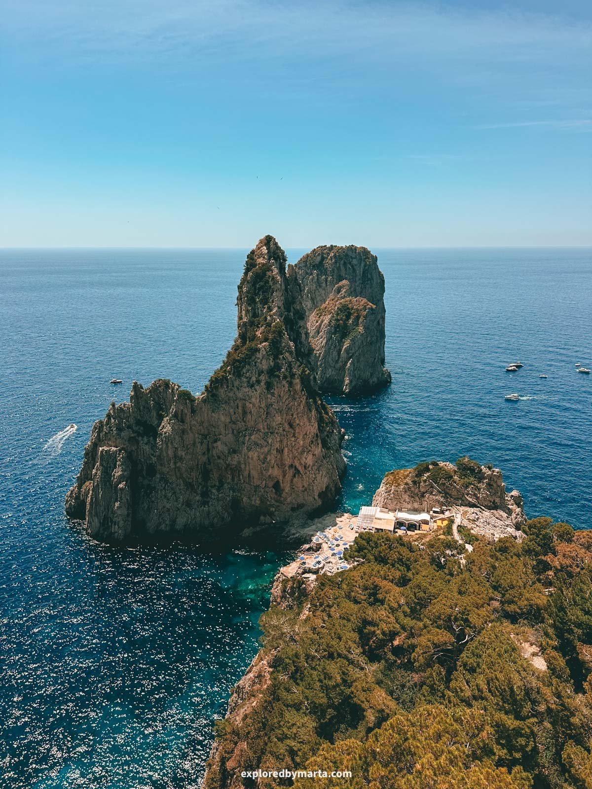 Faraglioni di Capri rocks from Pizzolungo trail in Capri Island, Italy