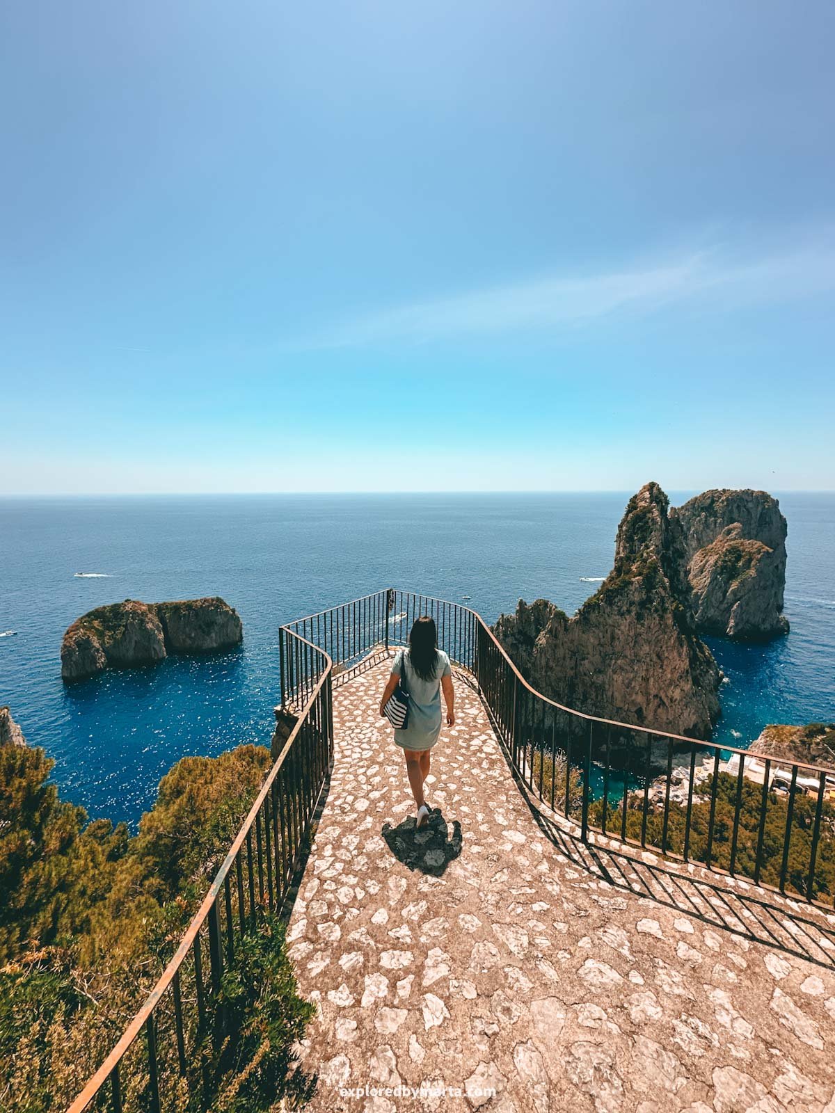 Faraglioni di Capri rocks from Pizzolungo trail in Capri Island, Italy