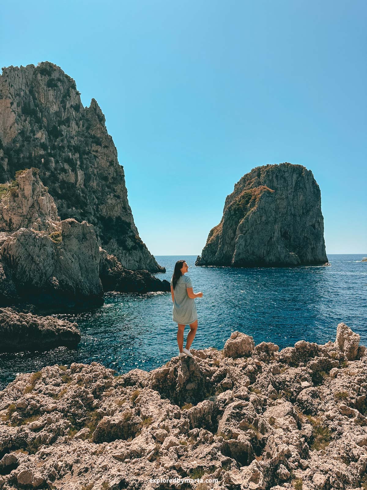 Faraglioni di Capri rocks from Pizzolungo trail in Capri Island, Italy