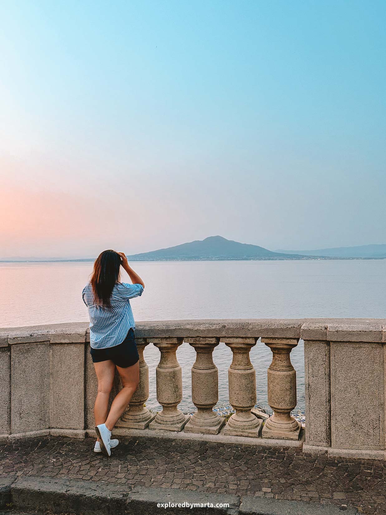 Sorrento, Italy-sunset view of Mount Vesuvius from Piazza della Vittoria in Sorrento