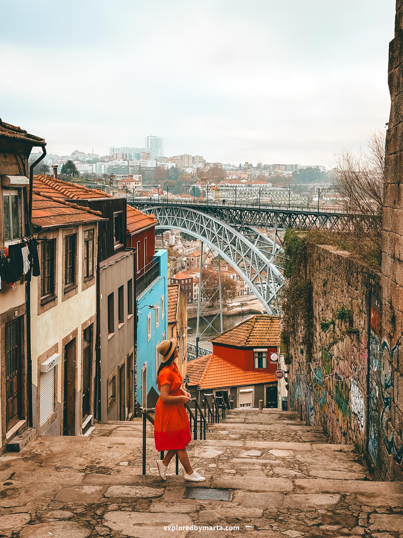 Escadas dos Guindais with a close-up view of the Dom Luís I Bridge in Porto, Portugal