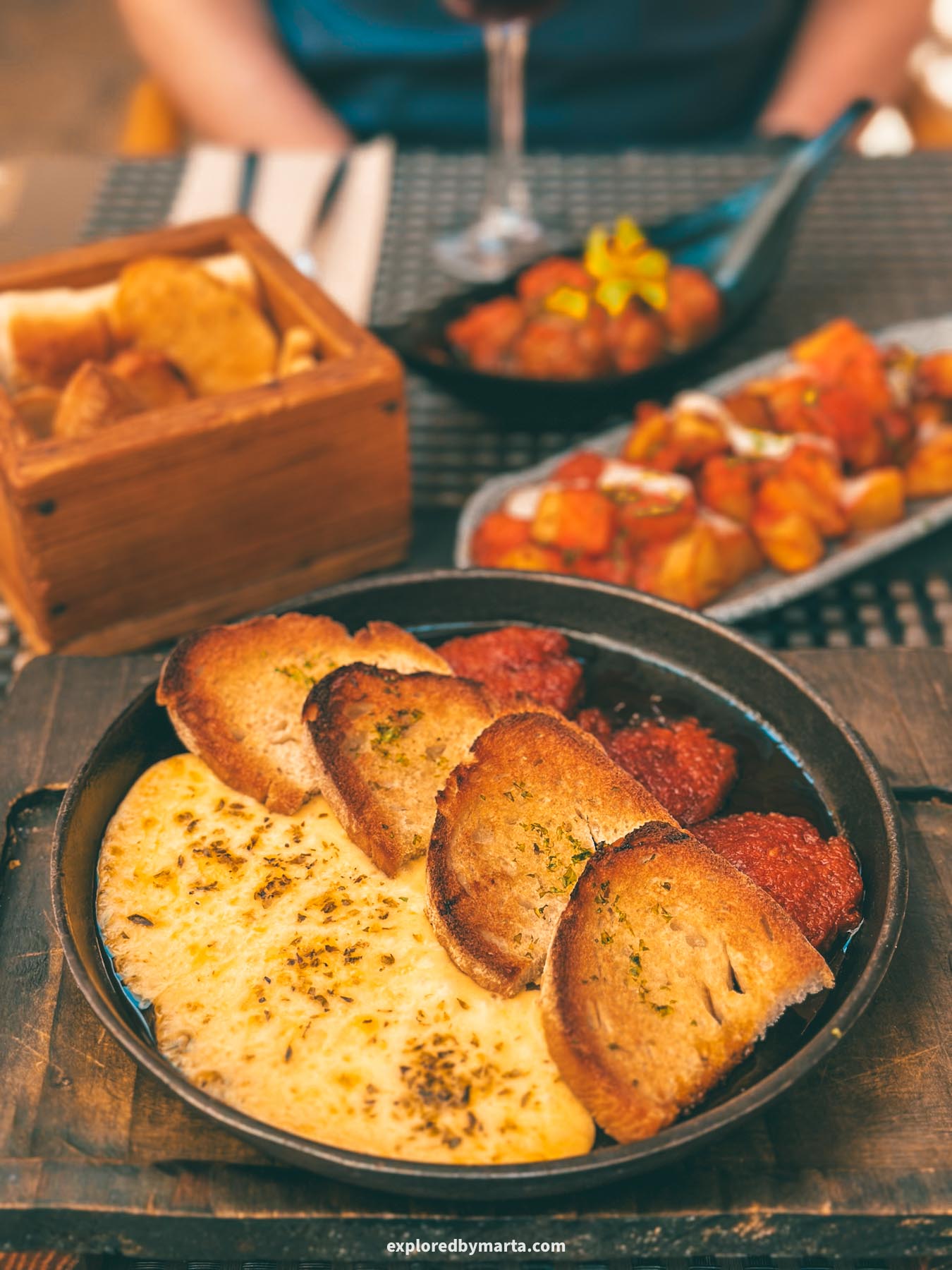 Mallorca, Spain-tapas with melted cheese and sobrasada, the famous Mallorcan sausage