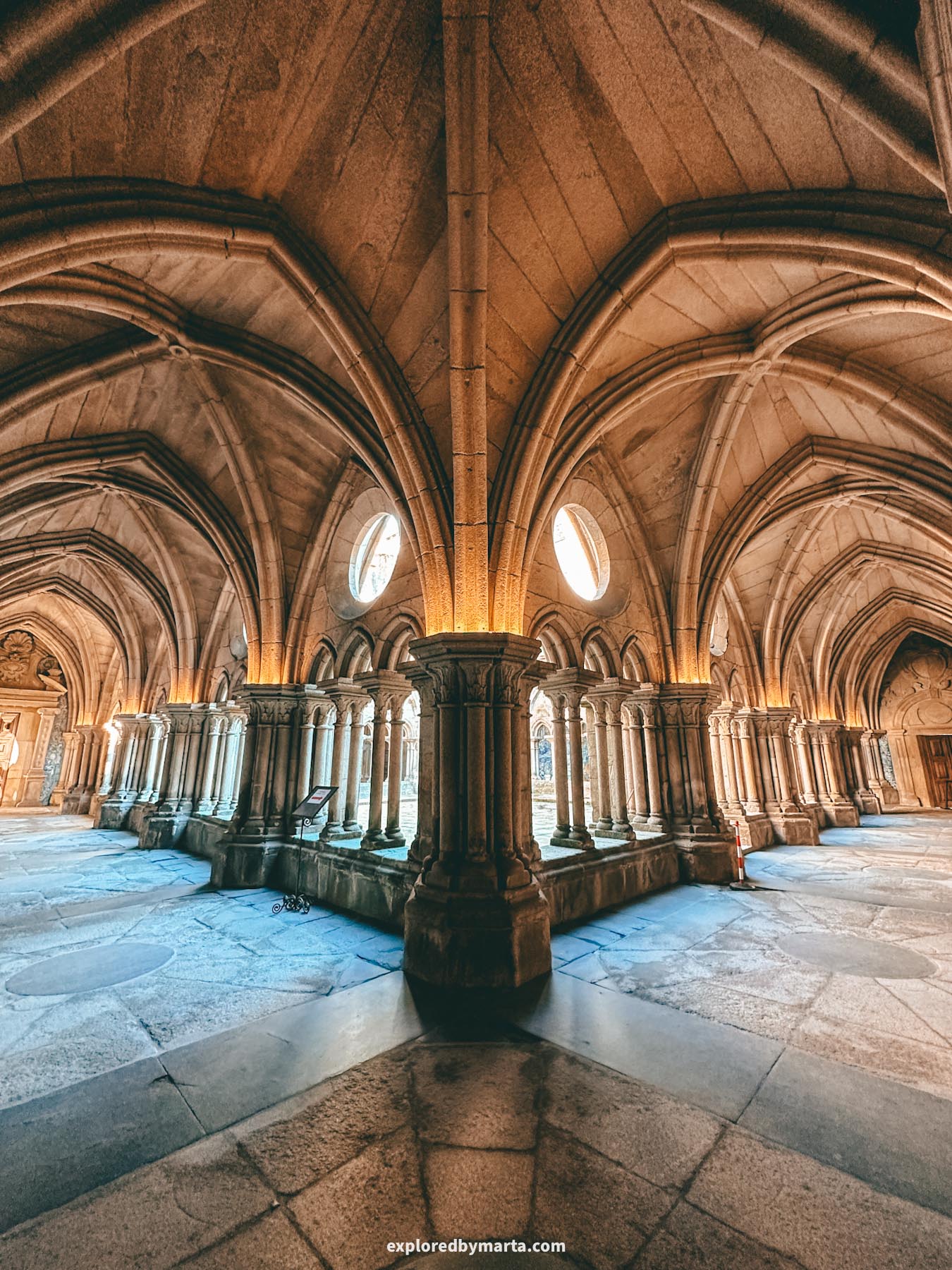 Porto Cathedral's gothic cloister is lined with arches and blue tiles