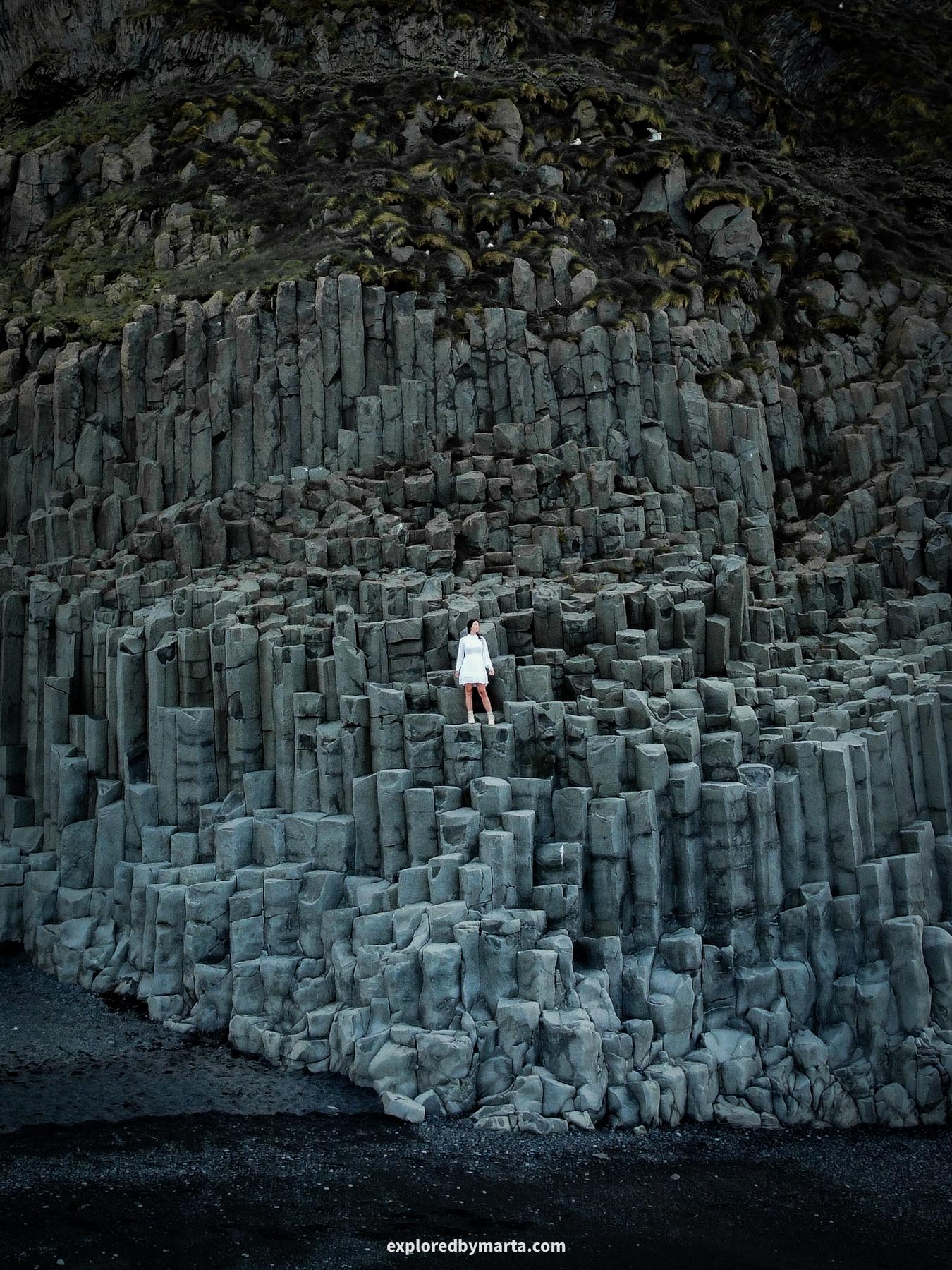 Basalt columns in Iceland in Reynisfjara black sand beach