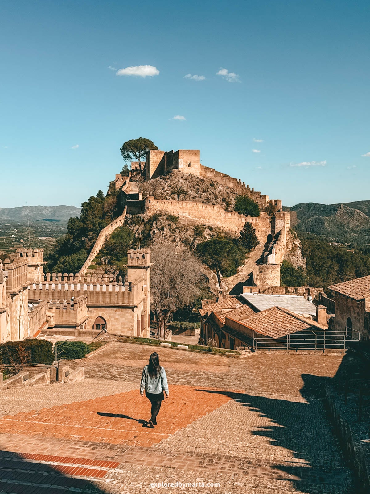 Exploring the majestic Xàtiva Castle on a hilltop overlooking Xátiva, Spain