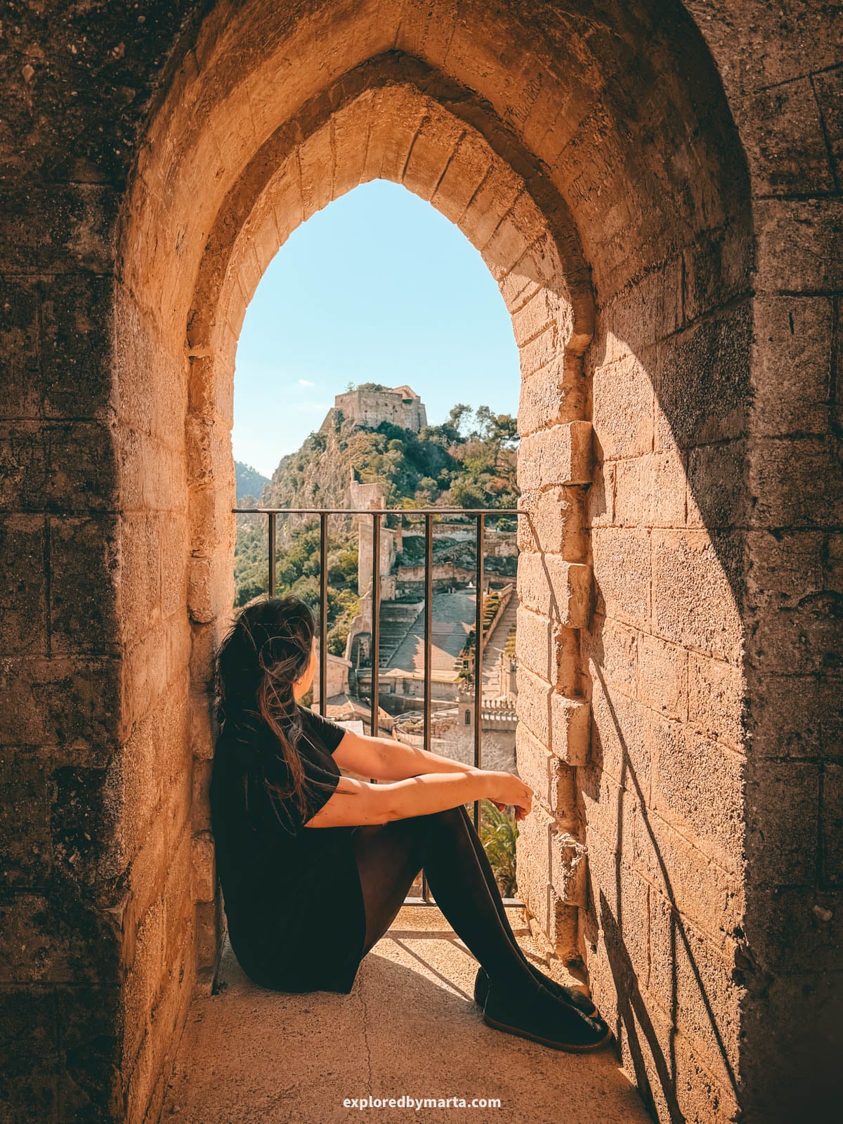 Exploring the majestic Xàtiva Castle on a hilltop overlooking Xátiva, Spain