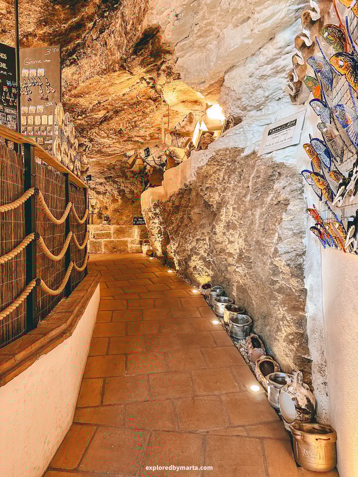 Shopping in Cueva Alta, the deepest cave in Setenil de las Bodegas cave village in Spain