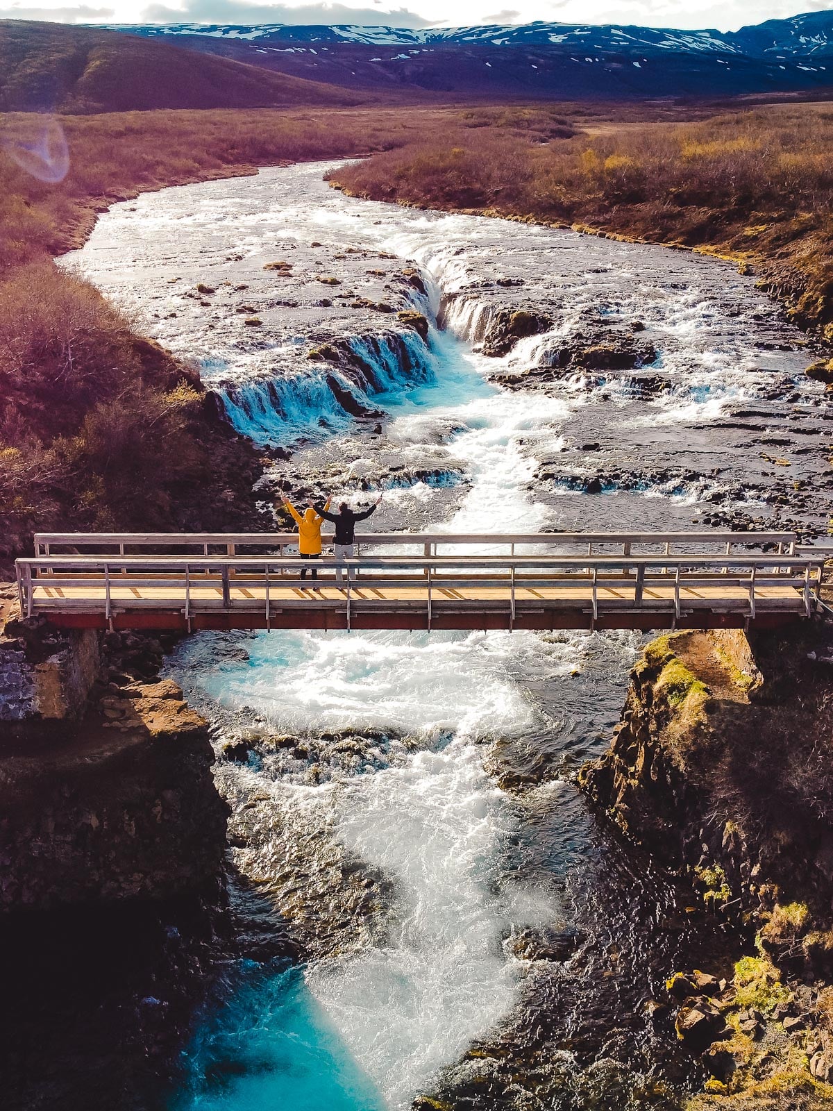 The vibrant blue Brúarfoss waterfall in Iceland