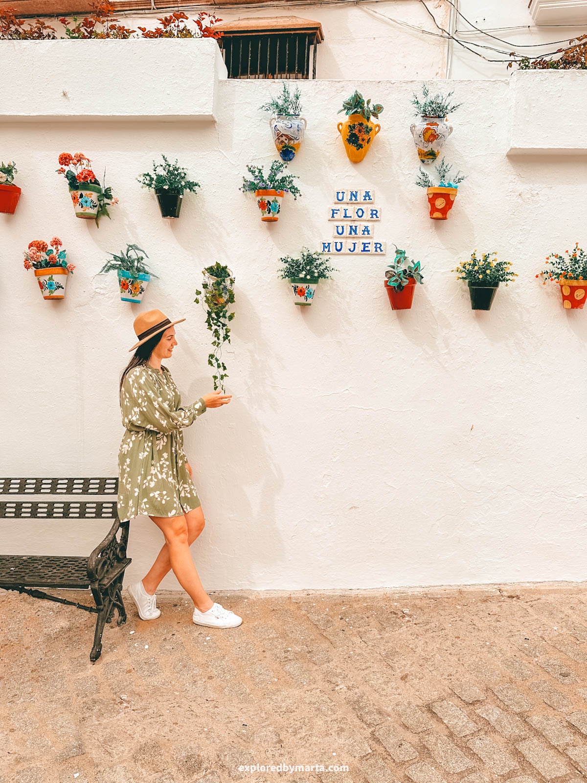 Una flor, una mujer or A flower, a woman phrase in Setenil de las Bodegas cave village in Spain