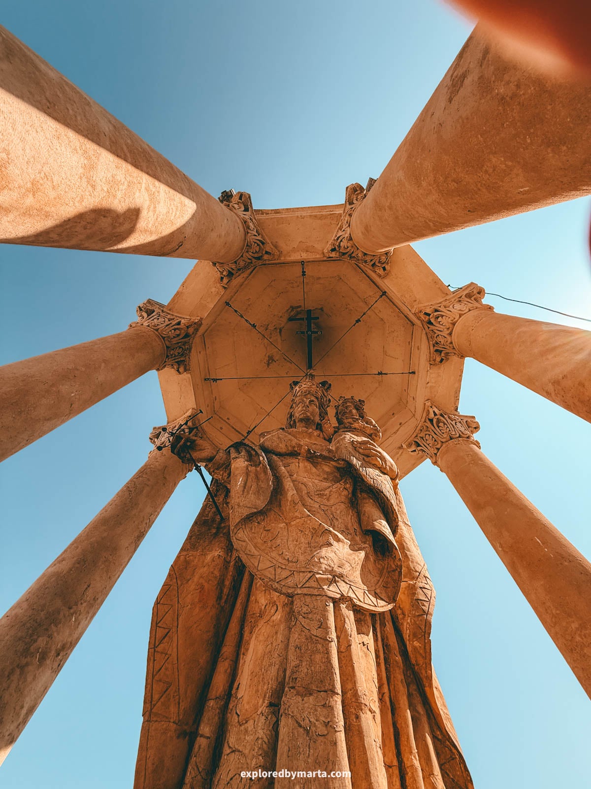 Admiring views over the old town when visiting the 69-meter bell tower of the Collegiate Basilica of Xàtiva, also known as La Seu, in Xativa, Spain