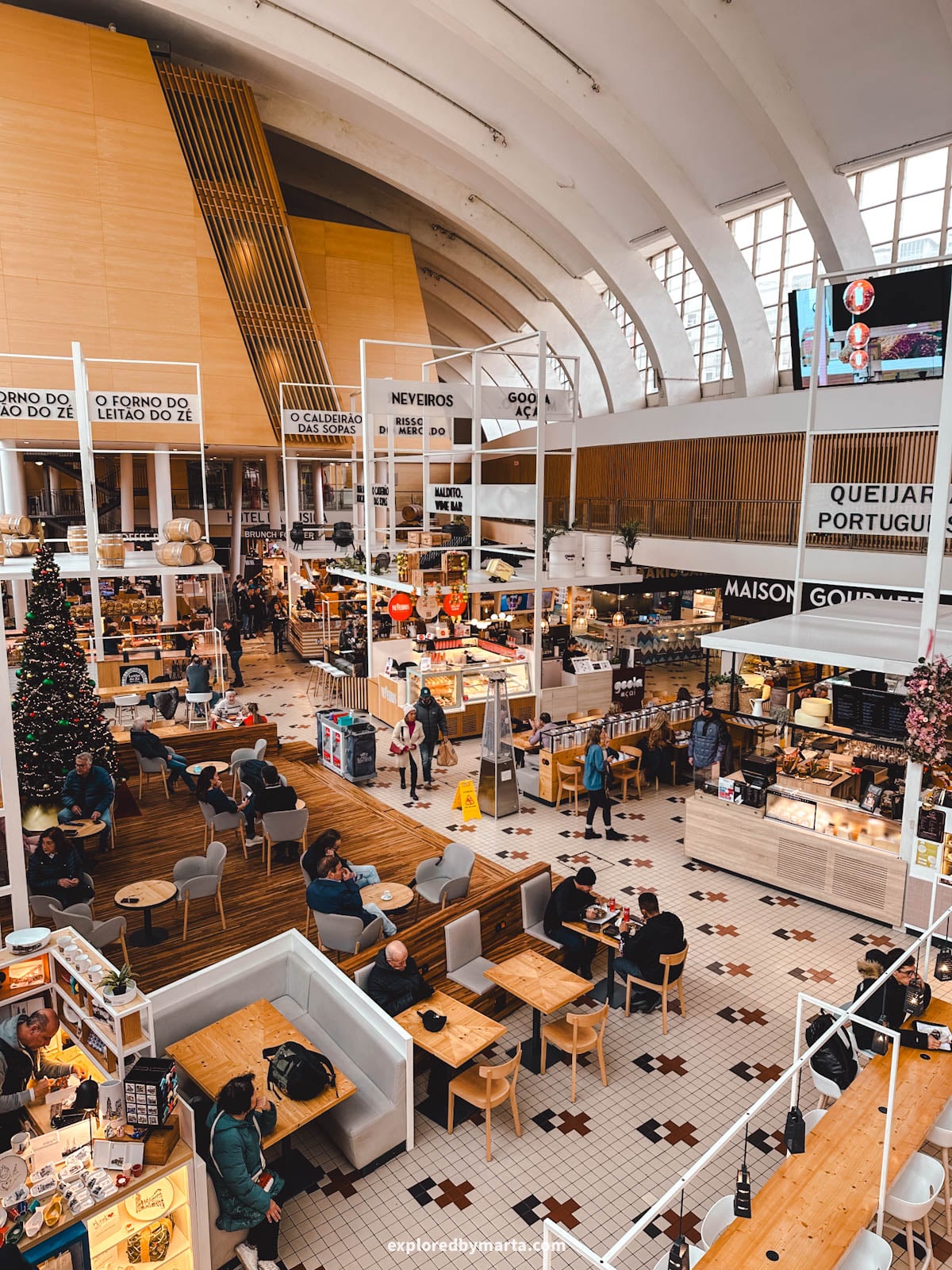 Mercado Bom Sucesso indoor market with food stalls in Porto, Portugal