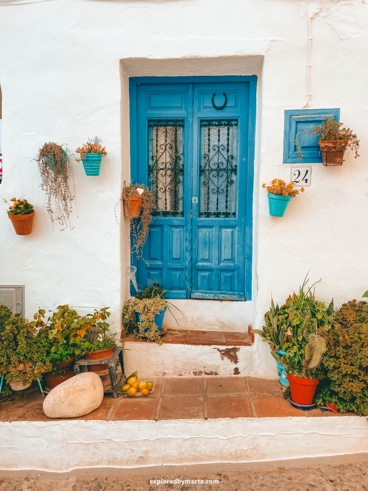 Picture-perfect colorful doors in Frigiliana, Spain
