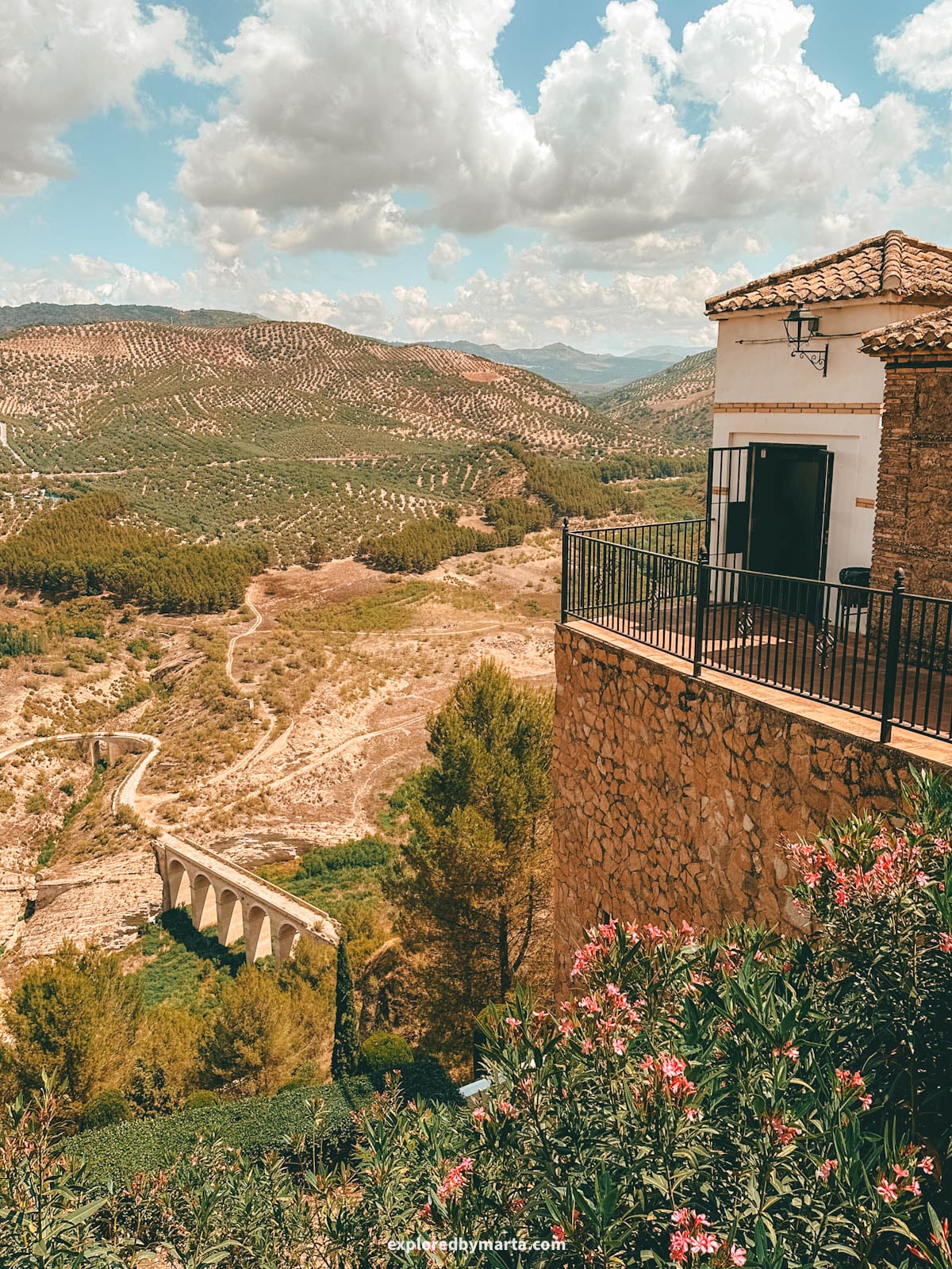 Views of olive trees from behind the church in Iznajar, Spain
