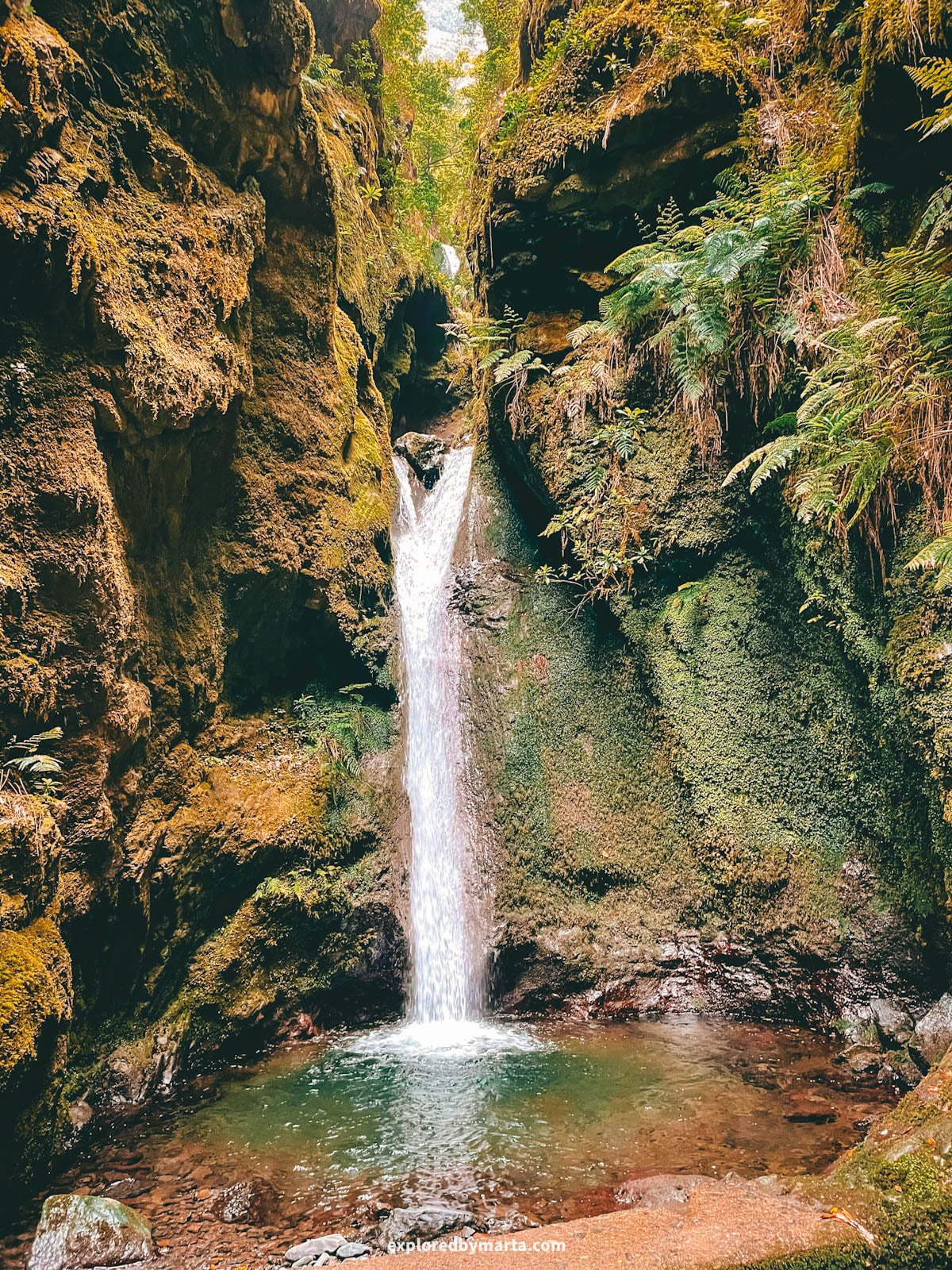 Waterfall along Levada do Caldeirão Verde-Caldeirão do Inferno hike in Madeira, Portugal