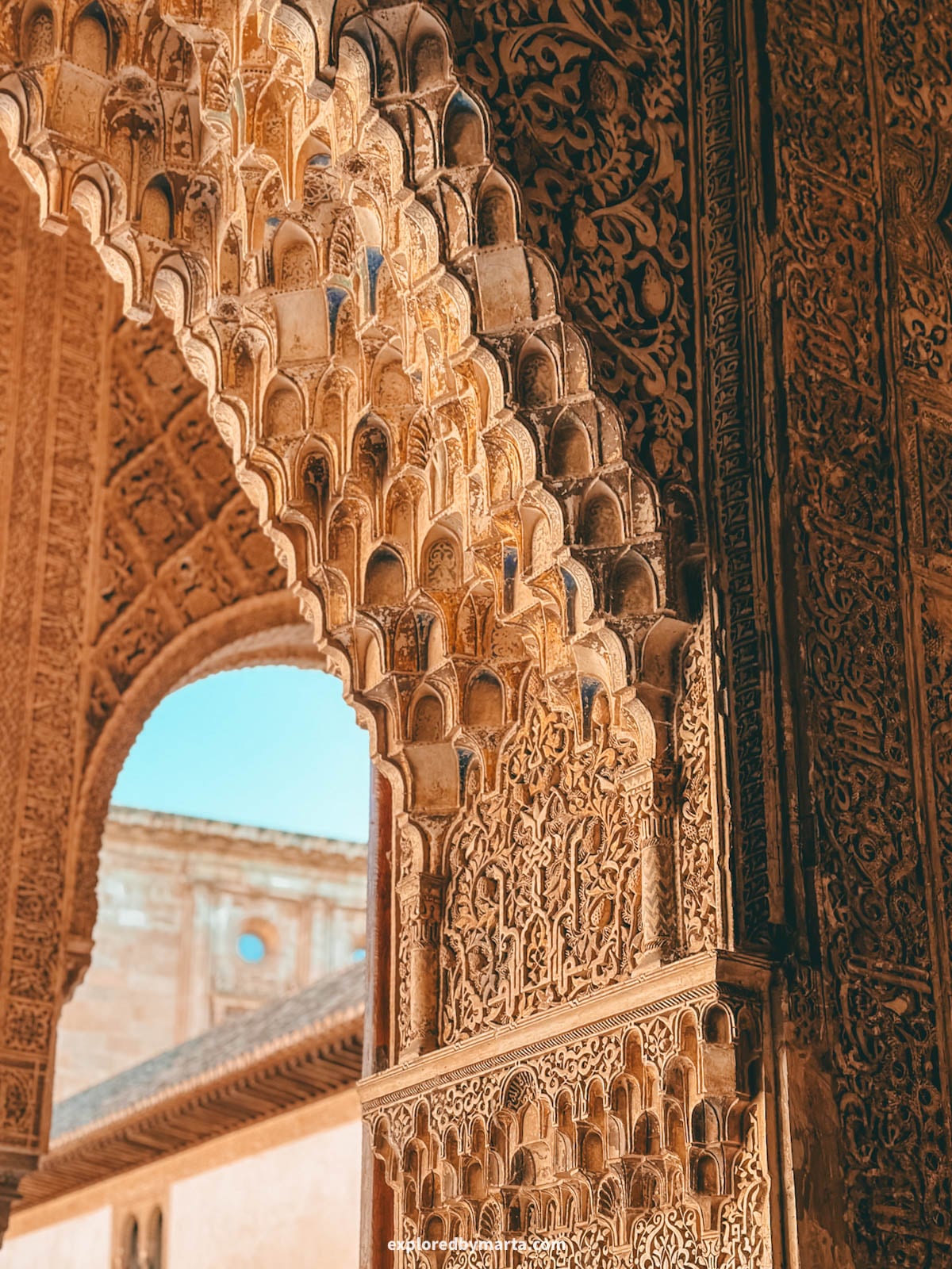 Amazing architecture inside the Nasrid Palaces in the Alhambra, Granada, Spain
