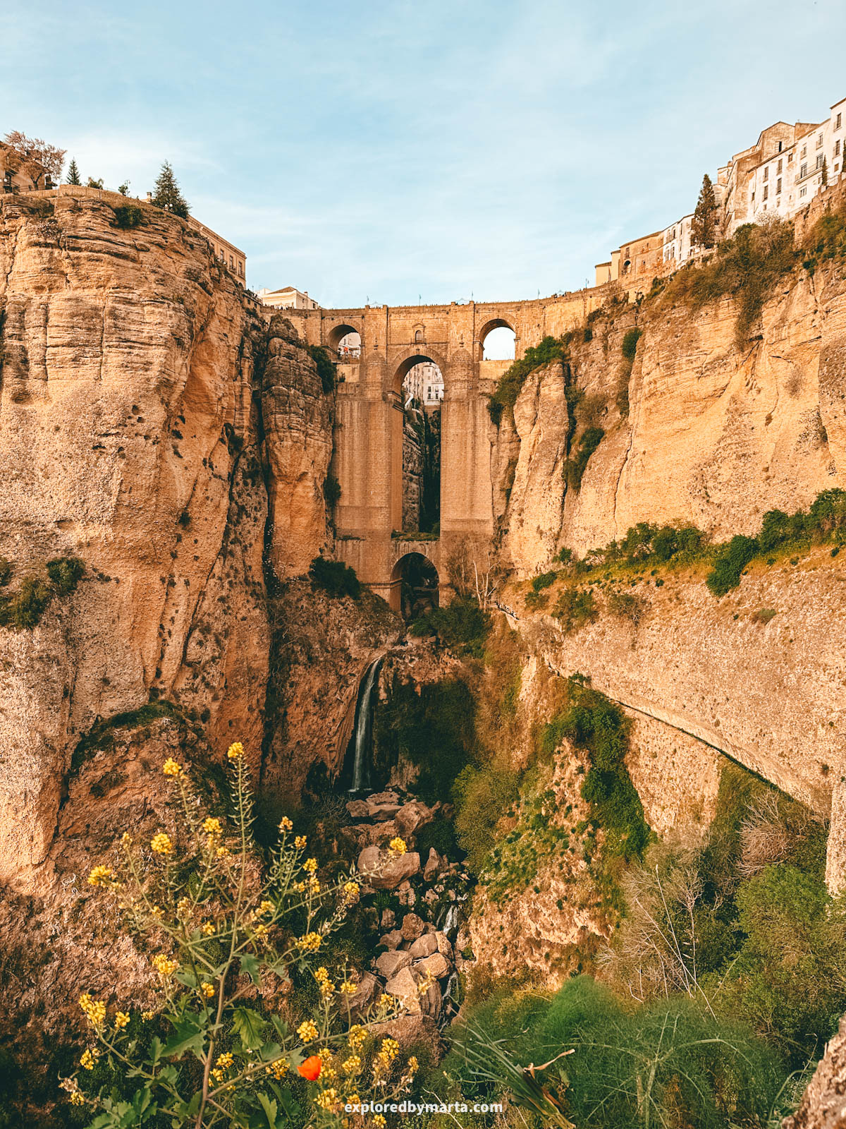 Camino del Desfiladero del Tajo goes down to the base of Puente Nuevo bridge in Ronda, Spain