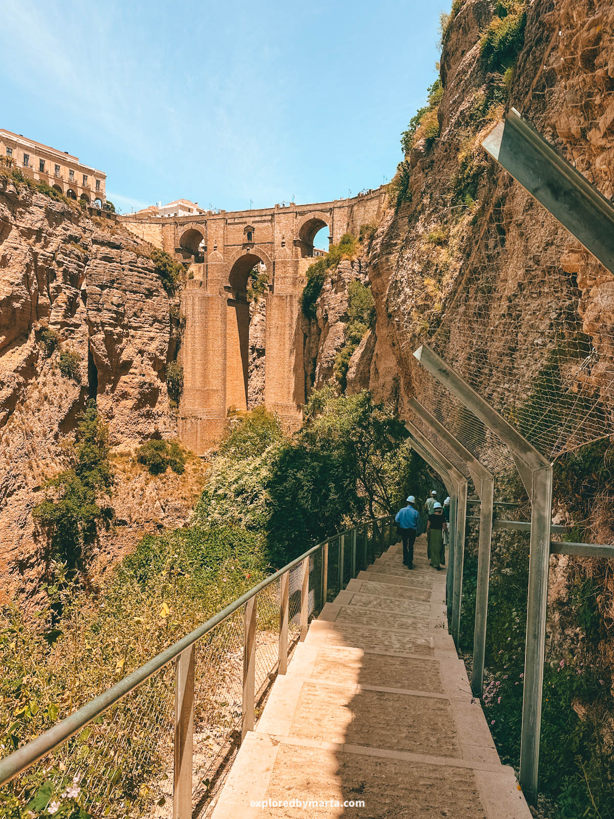 Camino del Desfiladero del Tajo goes down to the base of Puente Nuevo bridge in Ronda, Spain