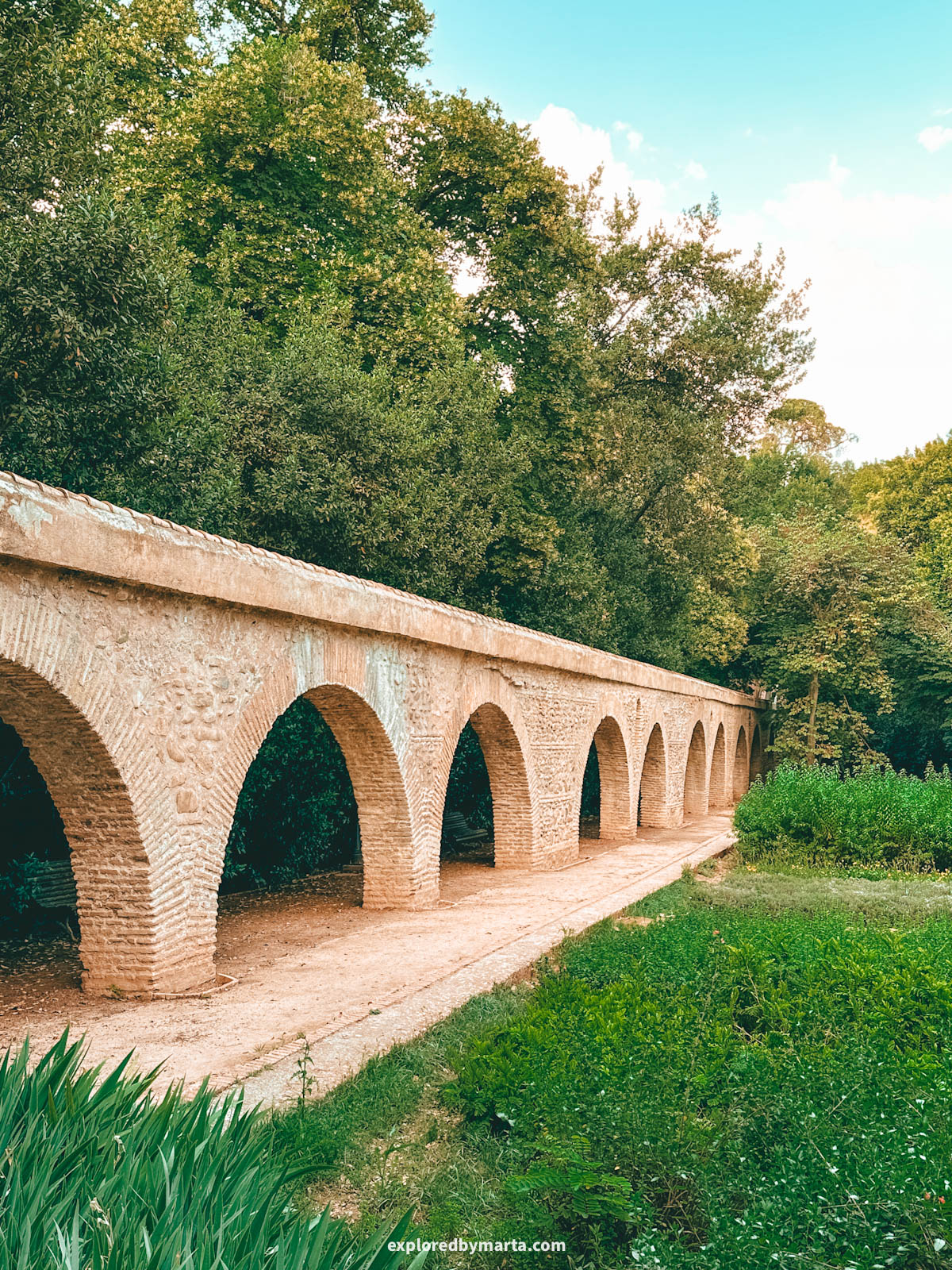 An aqueduct inside Carmen de los Mártires public gardens in Granada, Spain