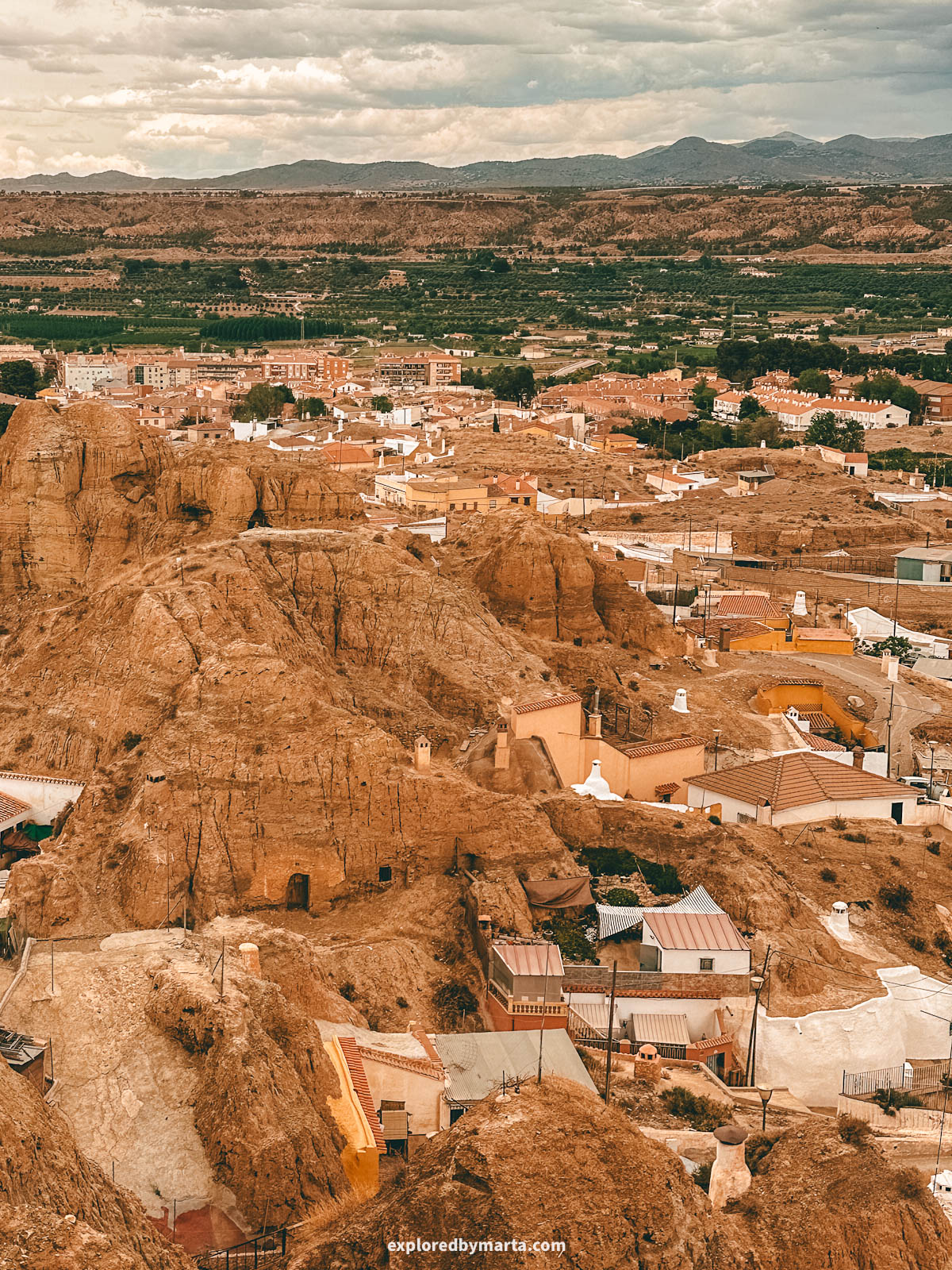 Cave houses neighborhood in Guadix, Spain