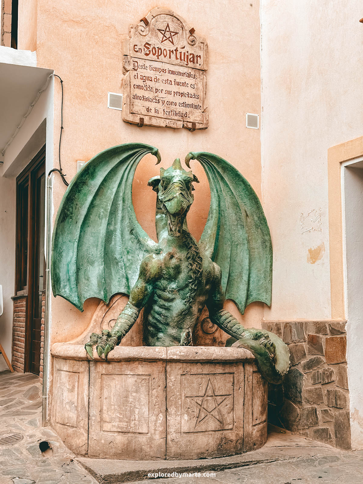 Fountain of the dragon in Soportújar witches' village, Spain