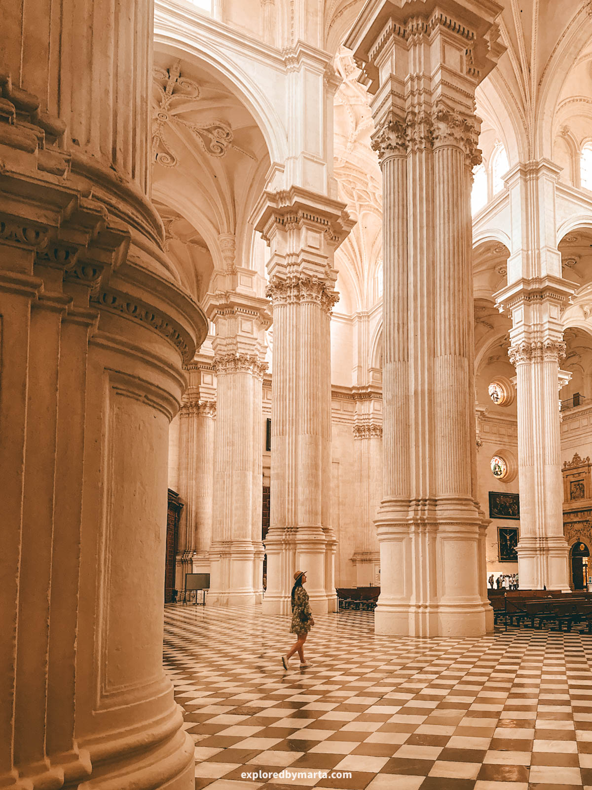 The white Renaissance nave of Granada Cathedral