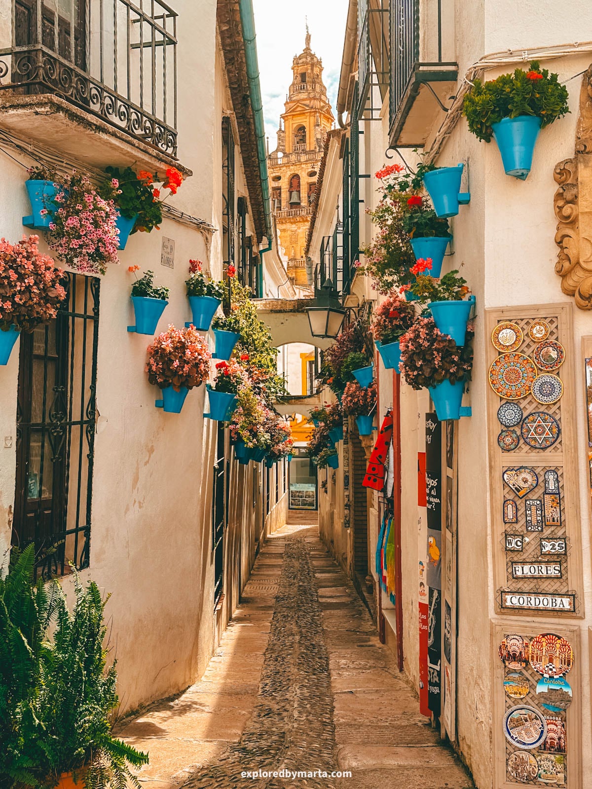 Iconic view of Torre Campanario seen from Calleja de las Flores in Córdoba, Spain