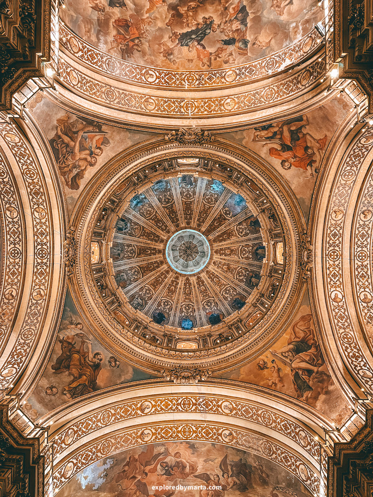Painted ceiling inside Basílica de San Juan de Dios in Granada, Spain