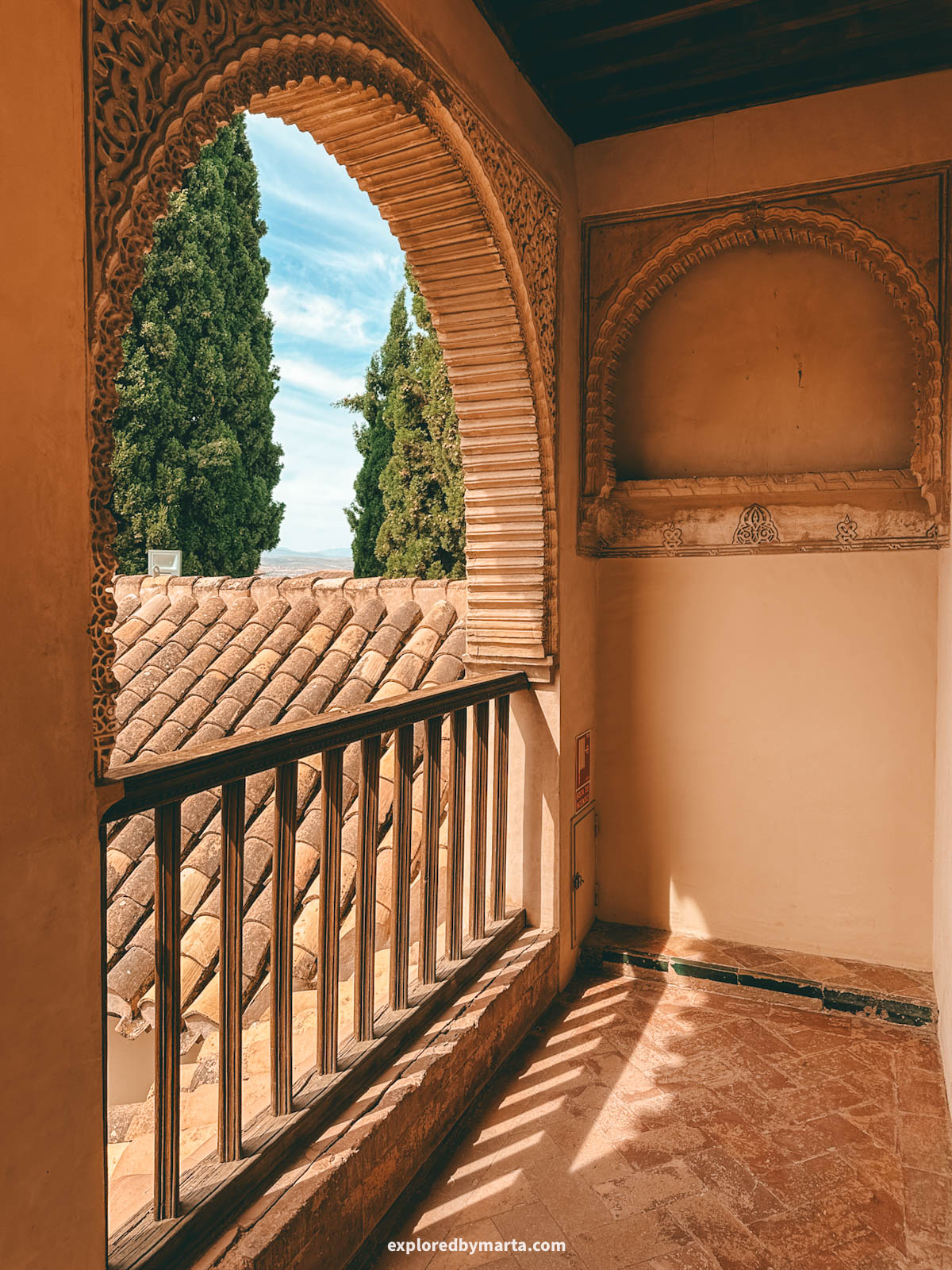 Moorish style arches inside Palacio Dar al-Horra, a Nasrid queen's hidden palace in Granada, Spain