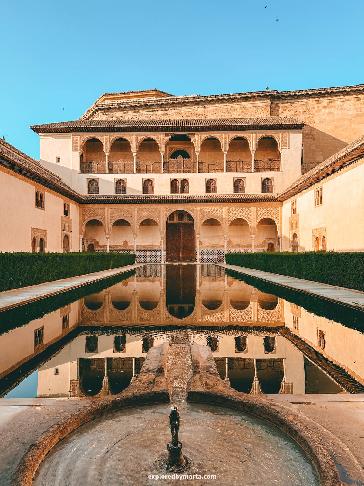 Patio de los Arrayanes or Patio de Comares in the Nasrid Palaces in the Alhambra, Granada, Spain