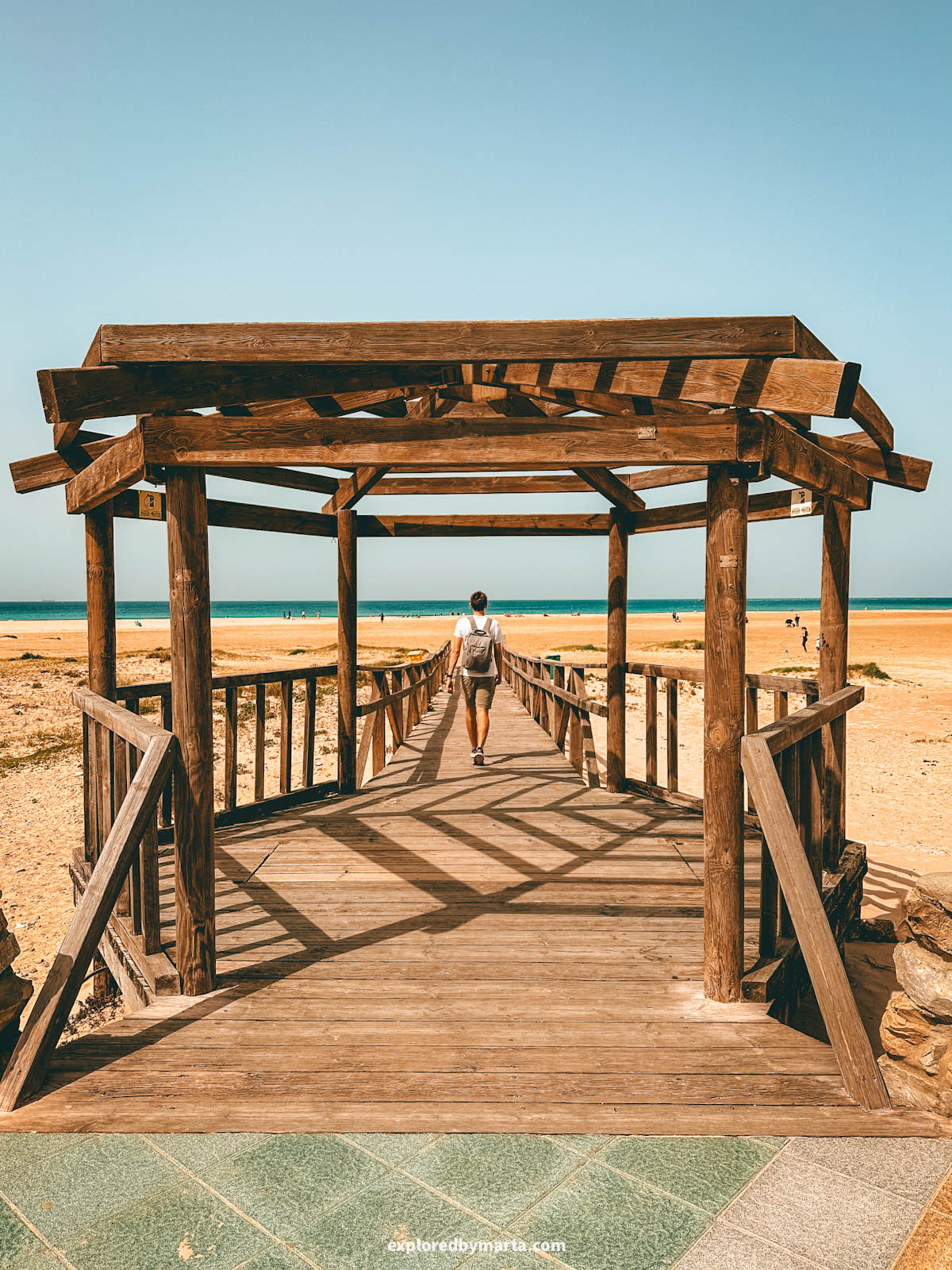 Strolling the seaside promenade in Tarifa, Spain