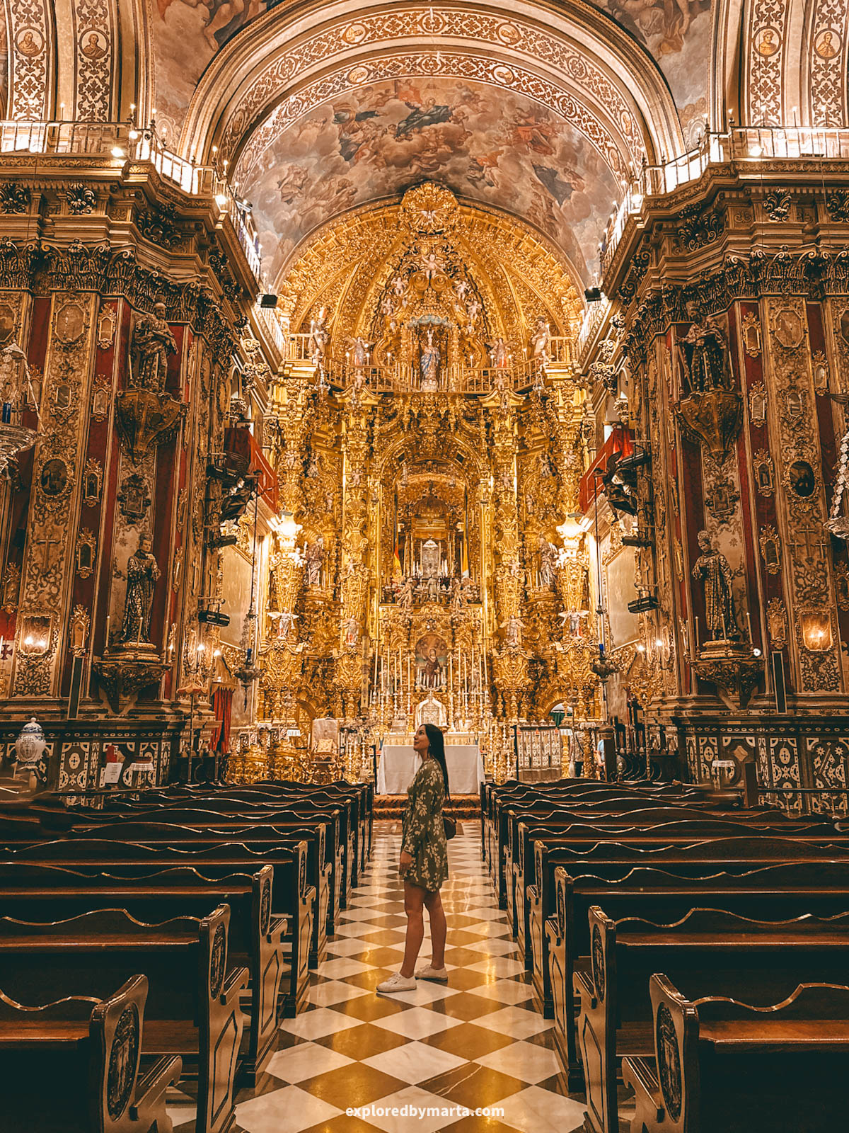 The gilded Baroque interior of Basílica de San Juan de Dios in Granada, Spain
